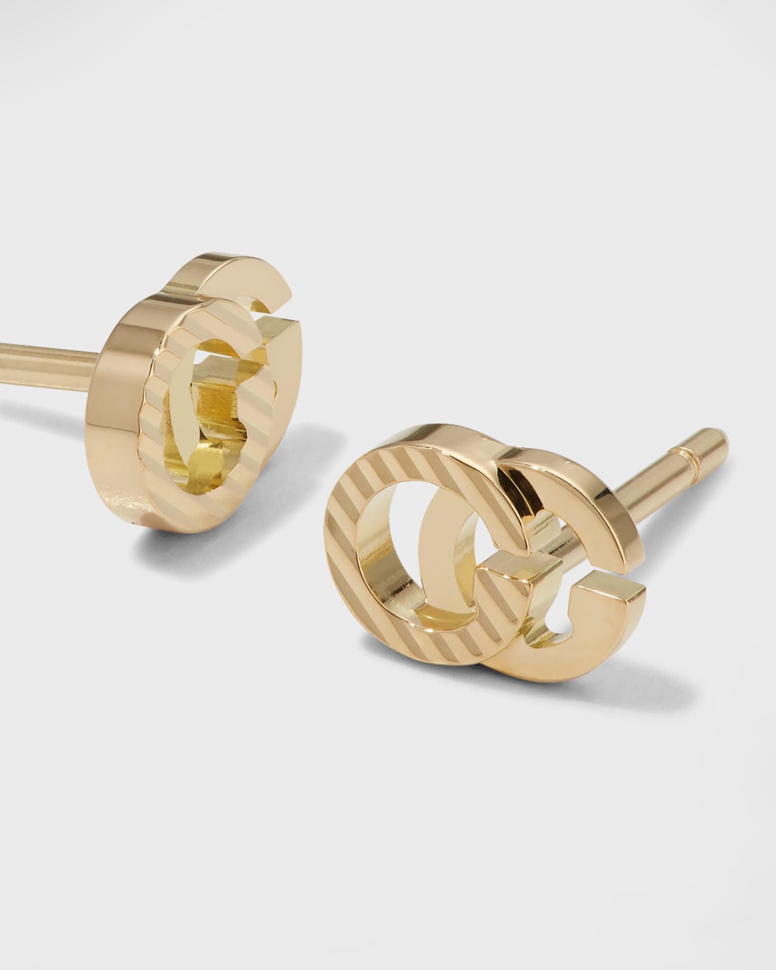 Gucci 18k yellow gold running g stud earrings clearance