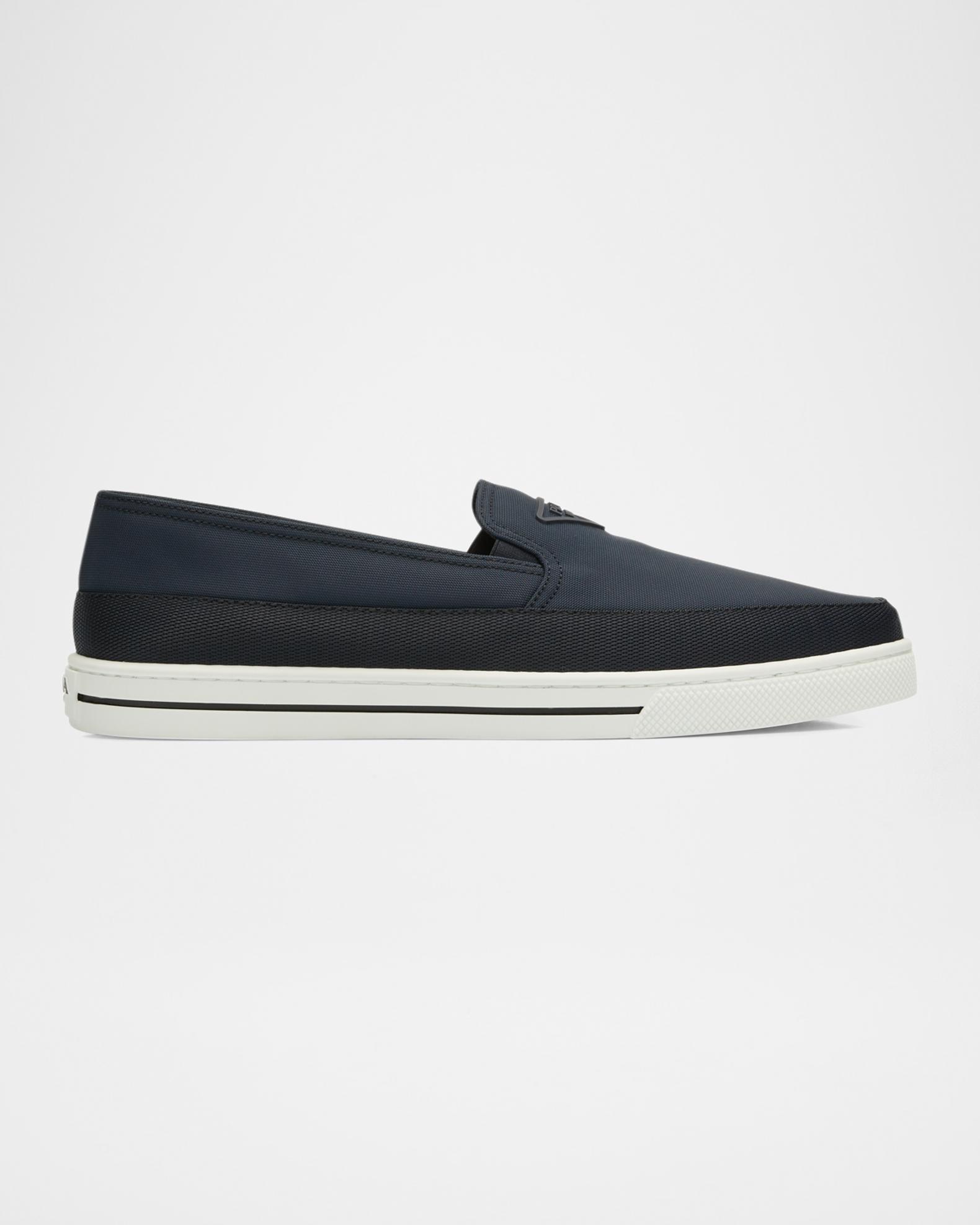 Prada Men\'s Shiny Black Leather Slip-Ons Prada Re-Nylon Slip-On Sneakers - Blue | Editorialist main image 4