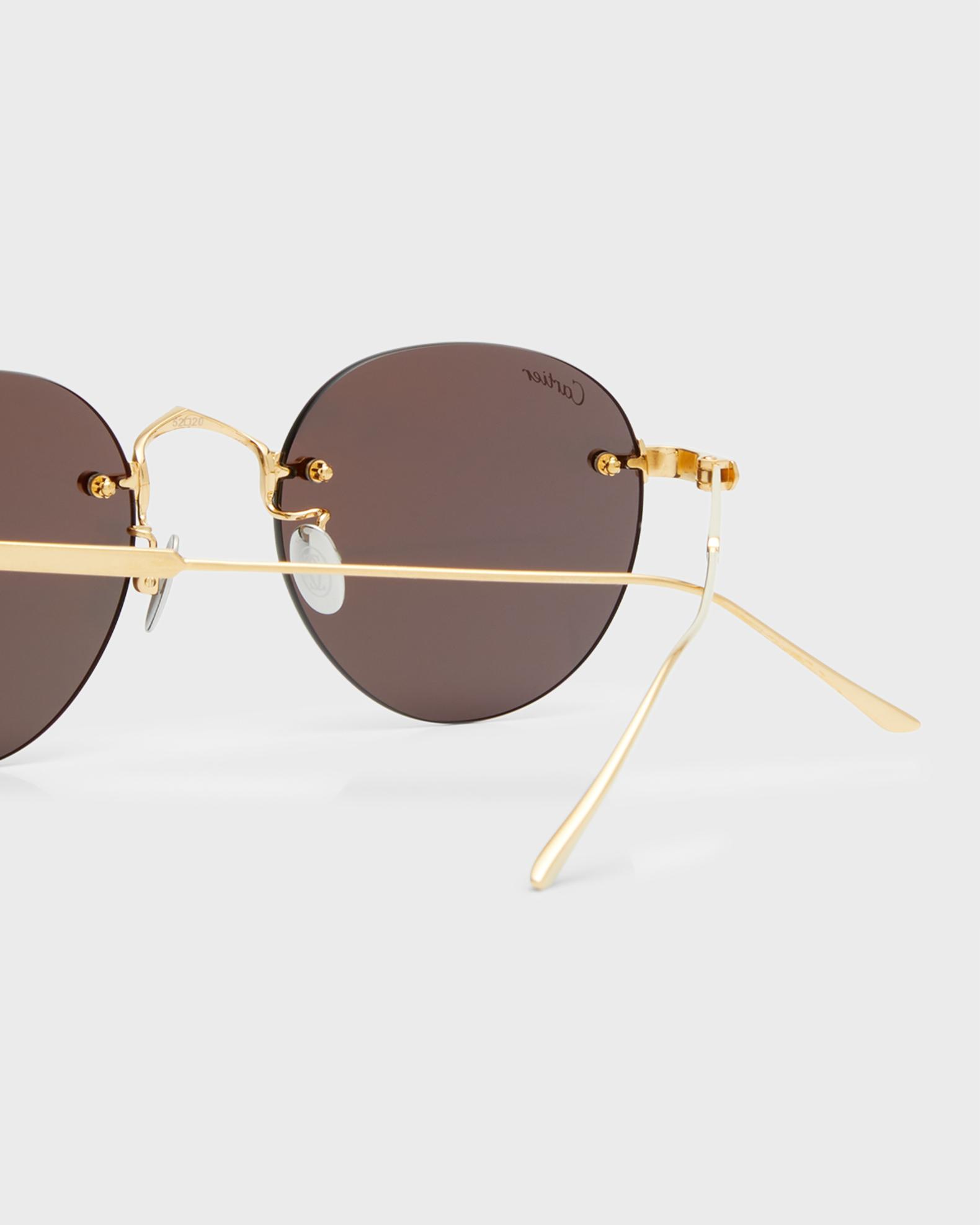 Cartier Men's Round Rimless Metal Sunglasses | Neiman Marcus