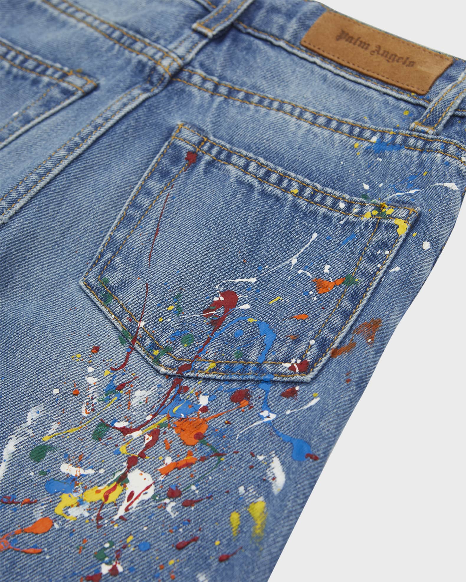 Men's Designer Patch Jeans with Paint Splatter | Differio