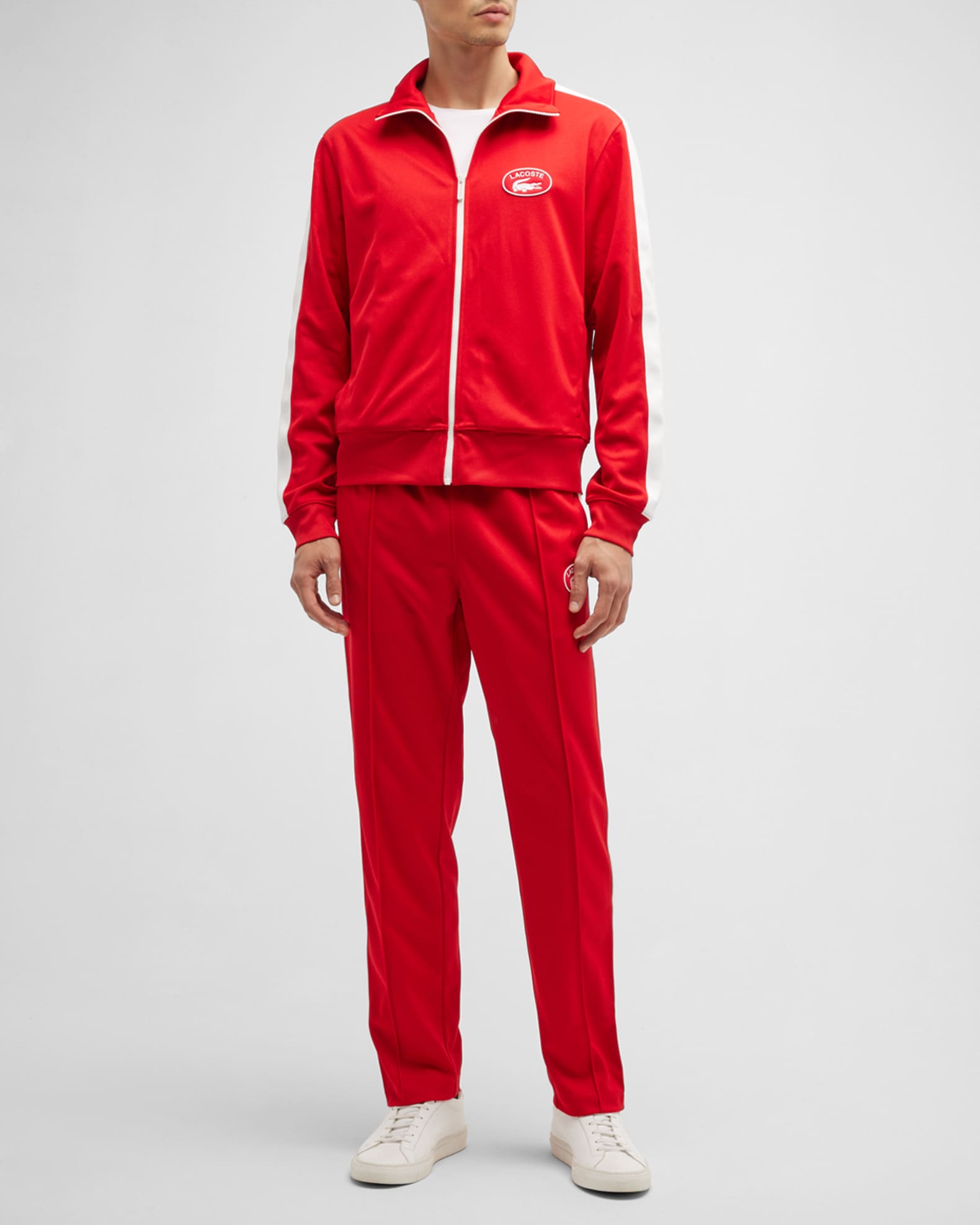 Red lacoste track pants sales