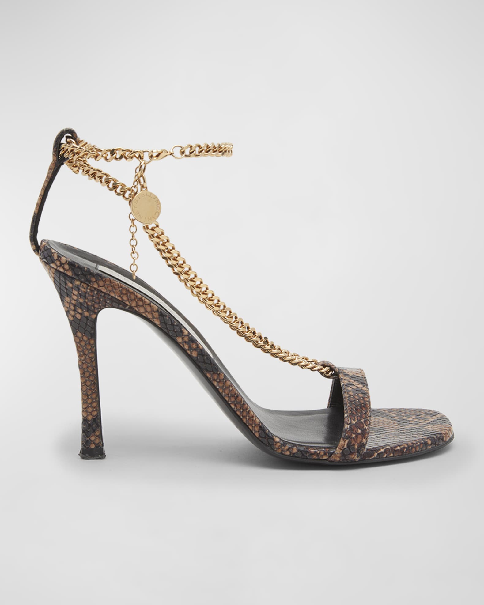 Snake print strappy heels with gold chain from Stella McCartney