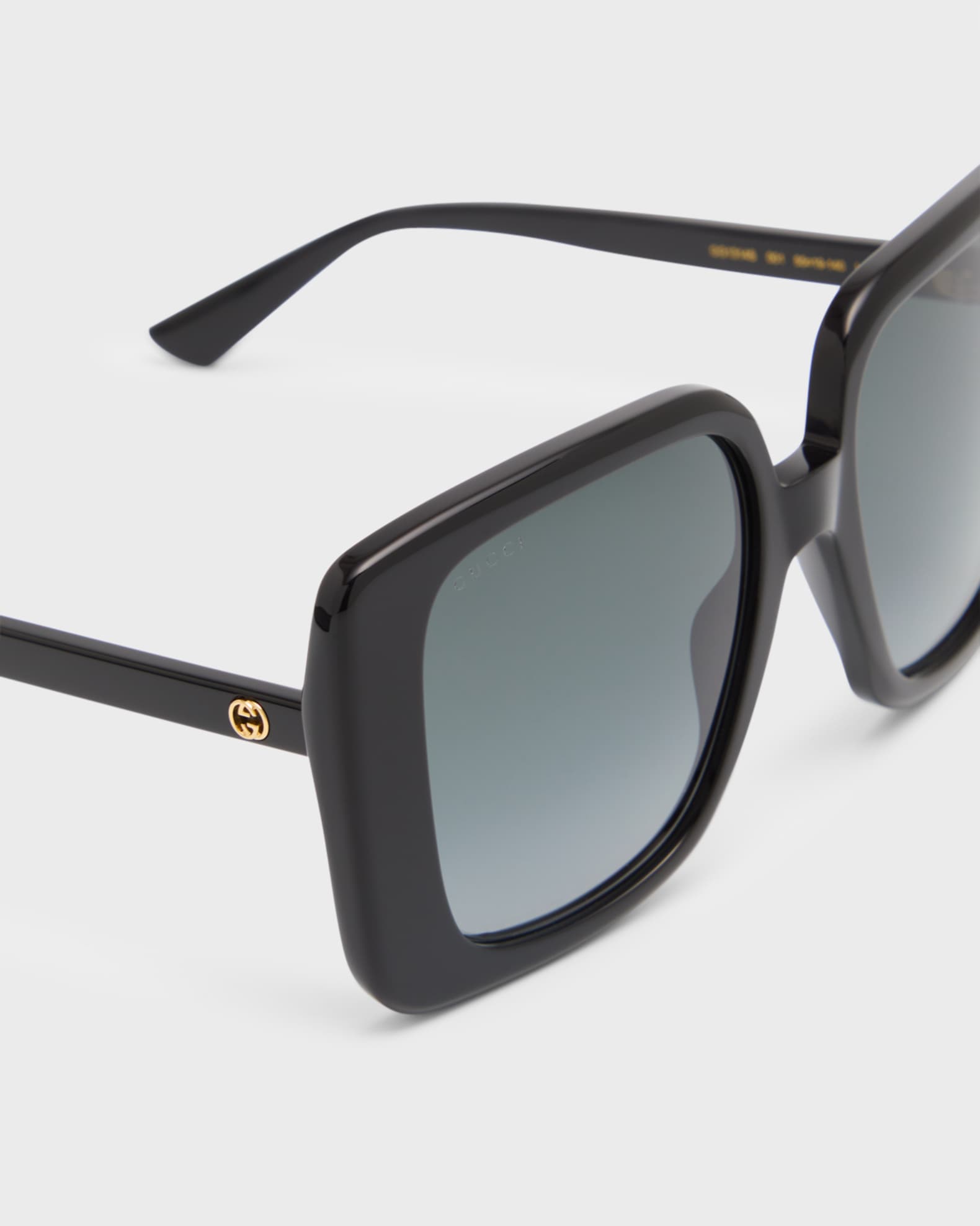 gucci shades with butterfly in the middle