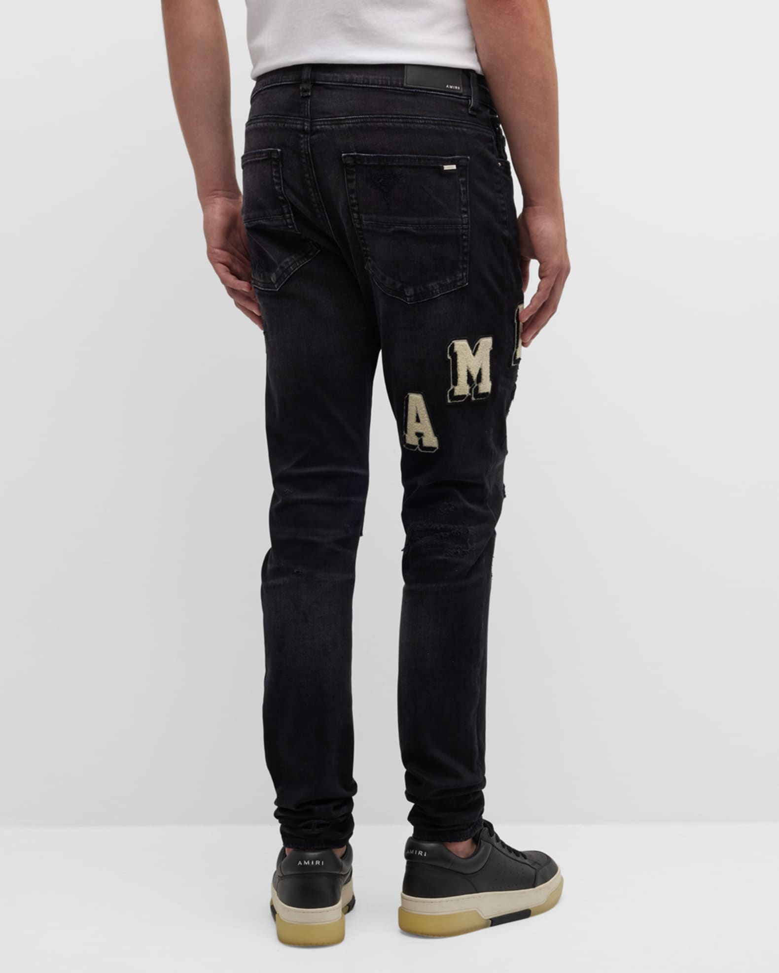 Amiri Men's Varsity Logo Skinny Jeans | Neiman Marcus