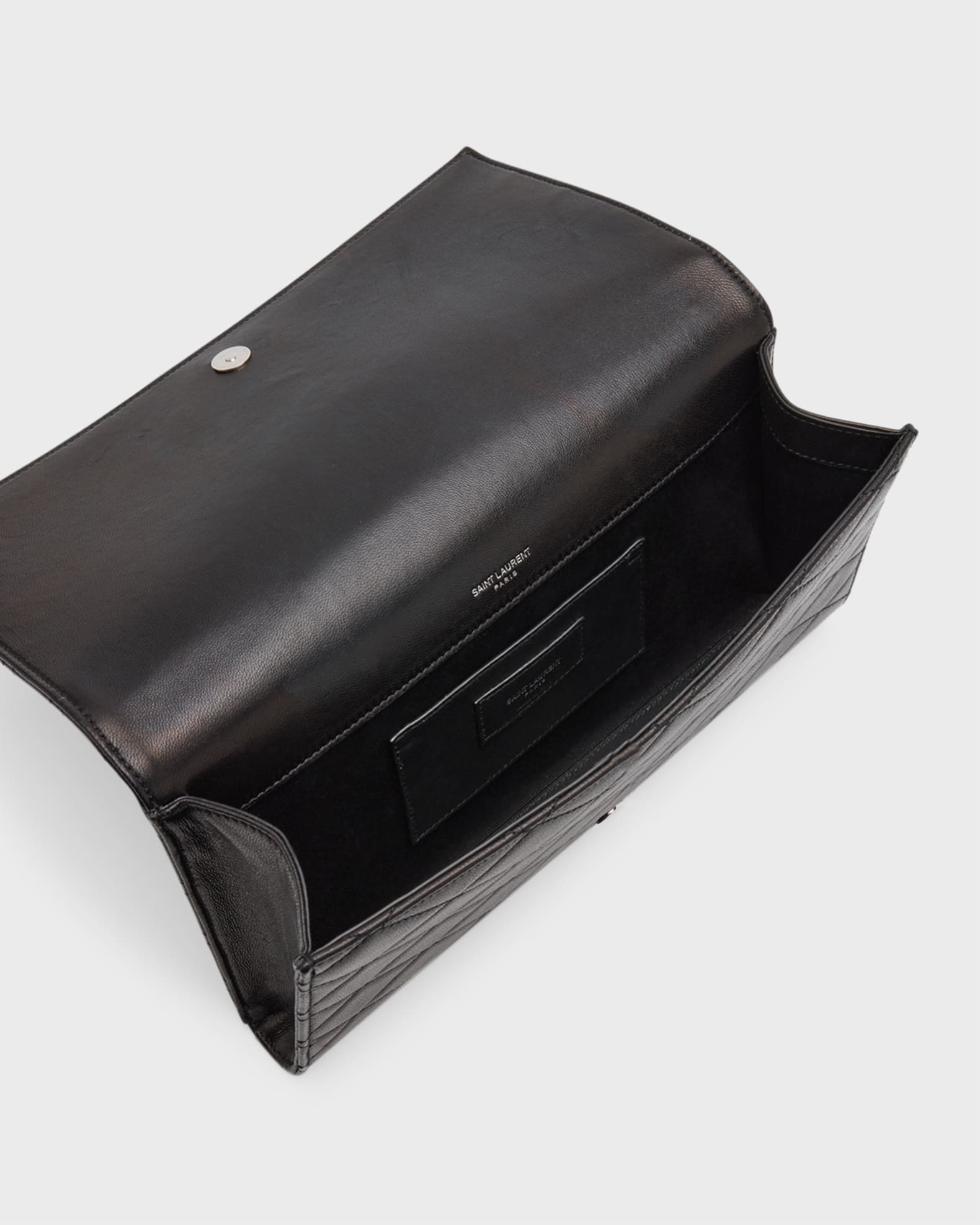 Ysl black quilted clutch 2025