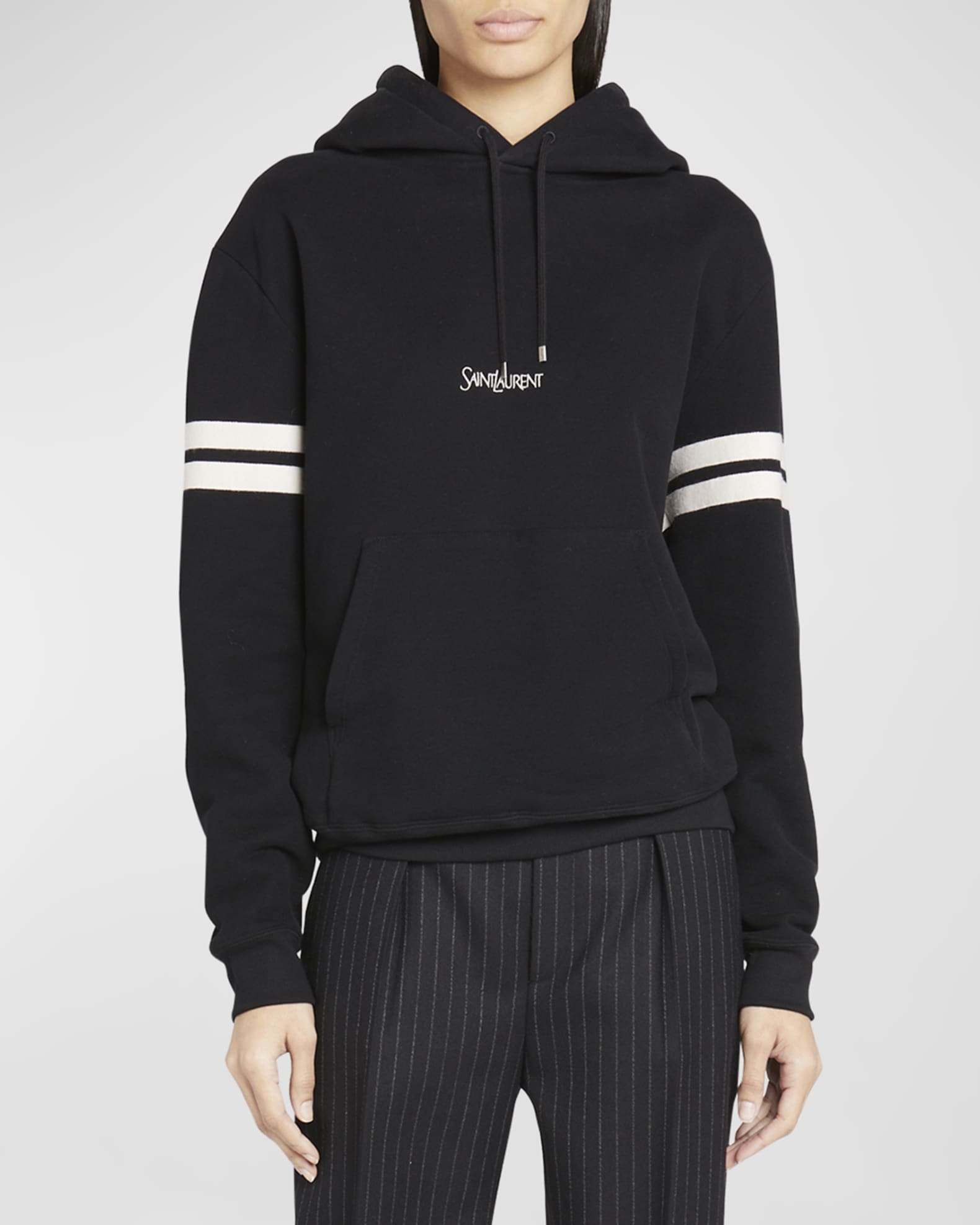 White hoodie with shop black stripes on sleeves