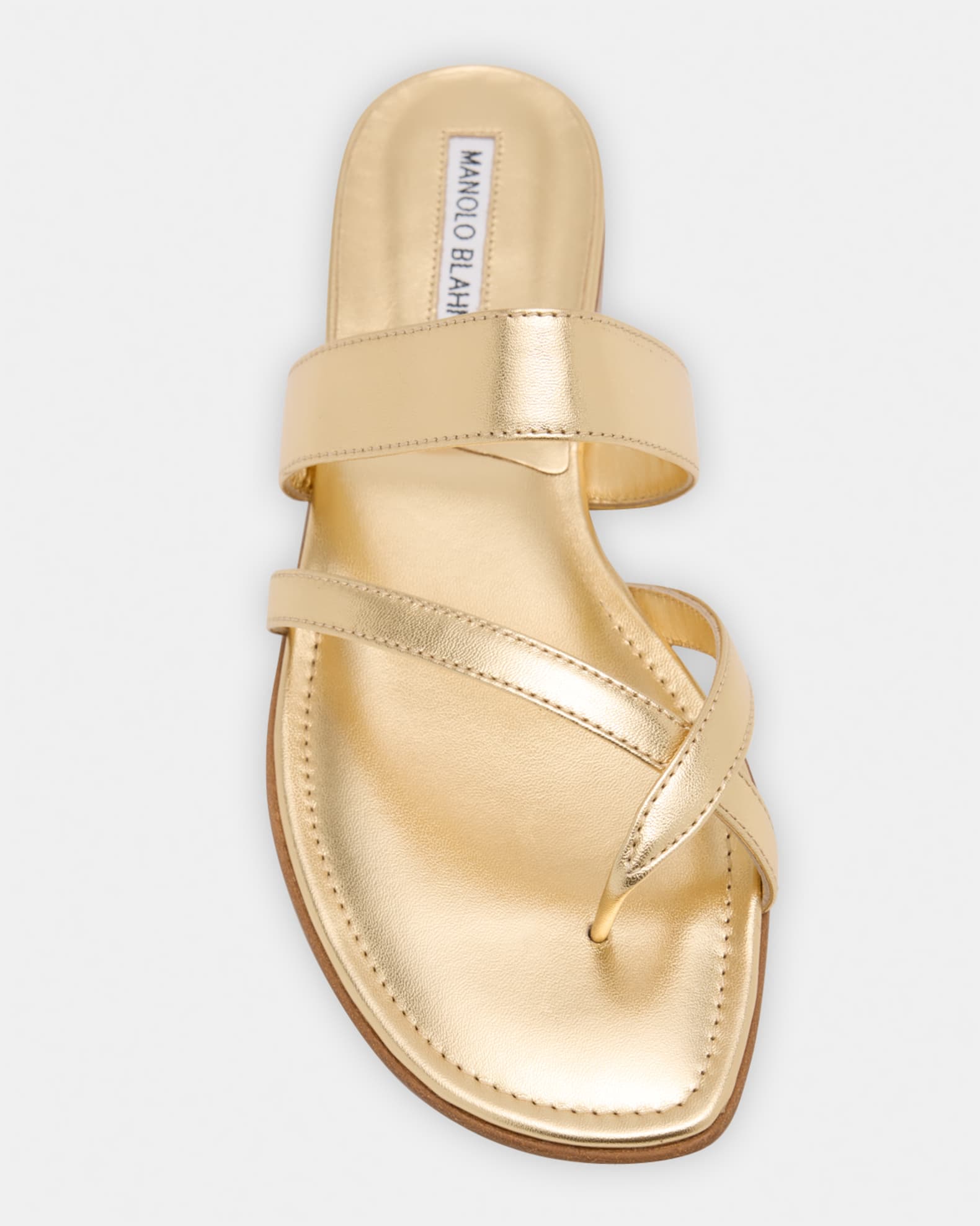 【上品カジュアル】Manolo Blahnik Susaスライドサンダル Manolo Blahnik Susa Metallic Crisscross Flat Sandals