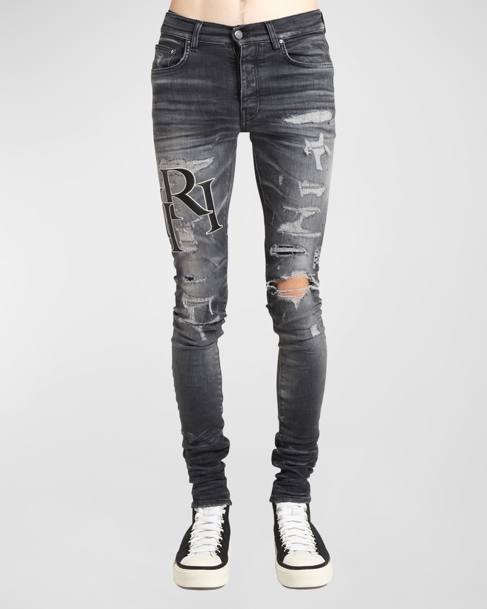 Amiri Men's Staggered Logo Skinny Jeans | Neiman Marcus
