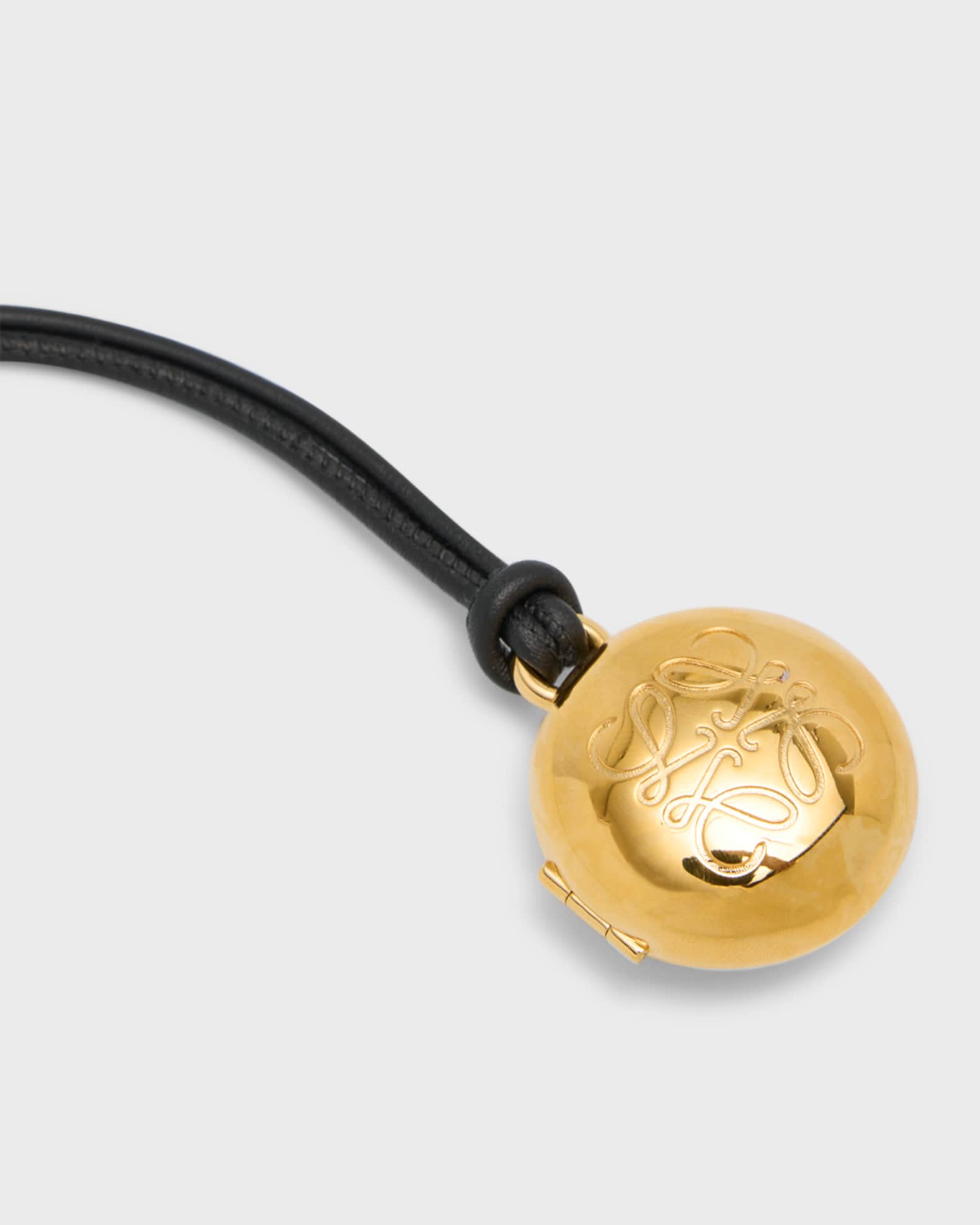Loewe Pebble Charm Locket in Brass | Neiman Marcus