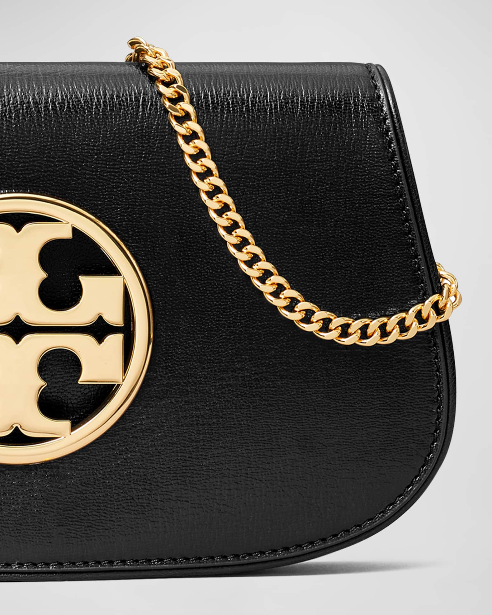 Tory burch leather best sale clutch