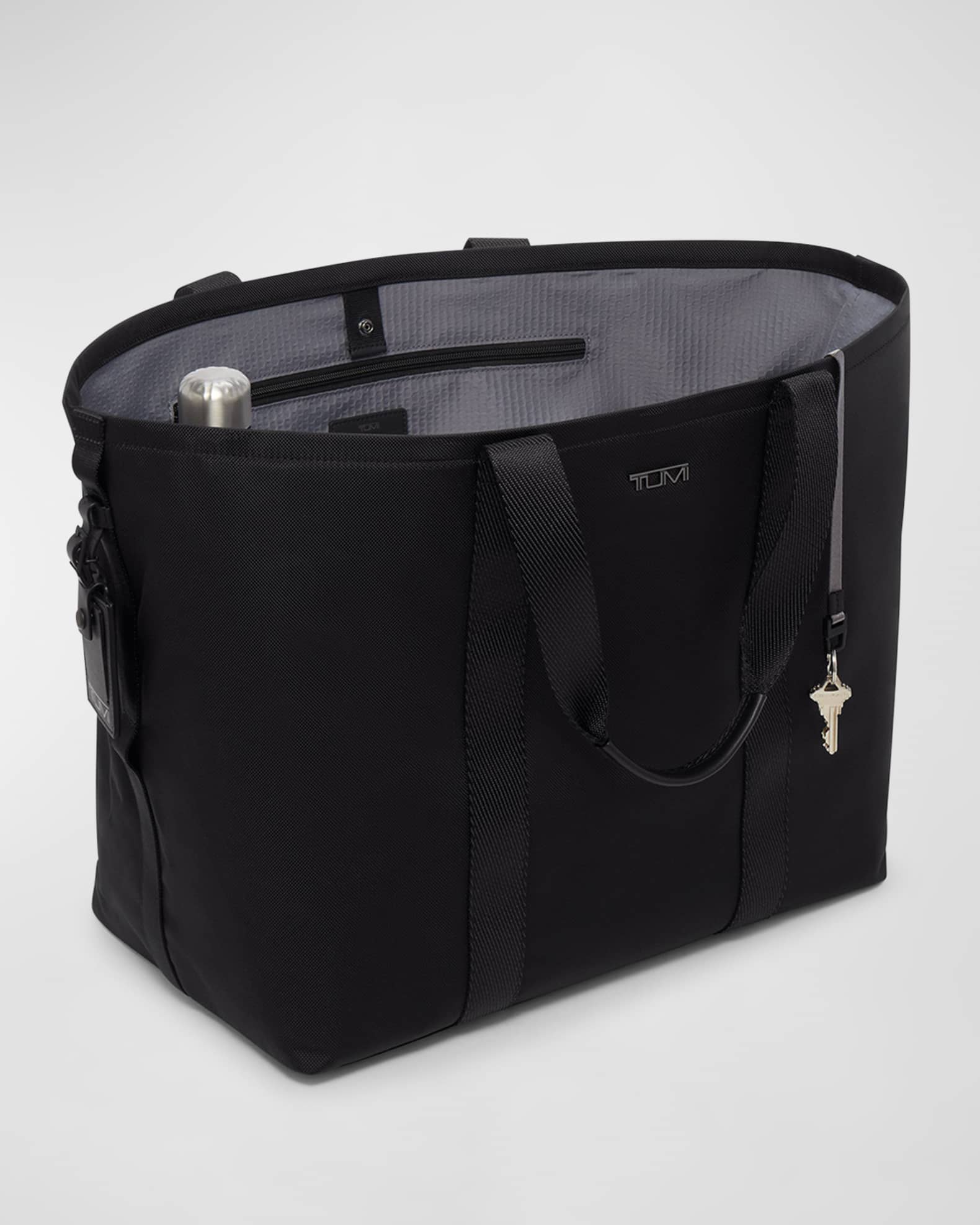 Tumi canvas bag clearance