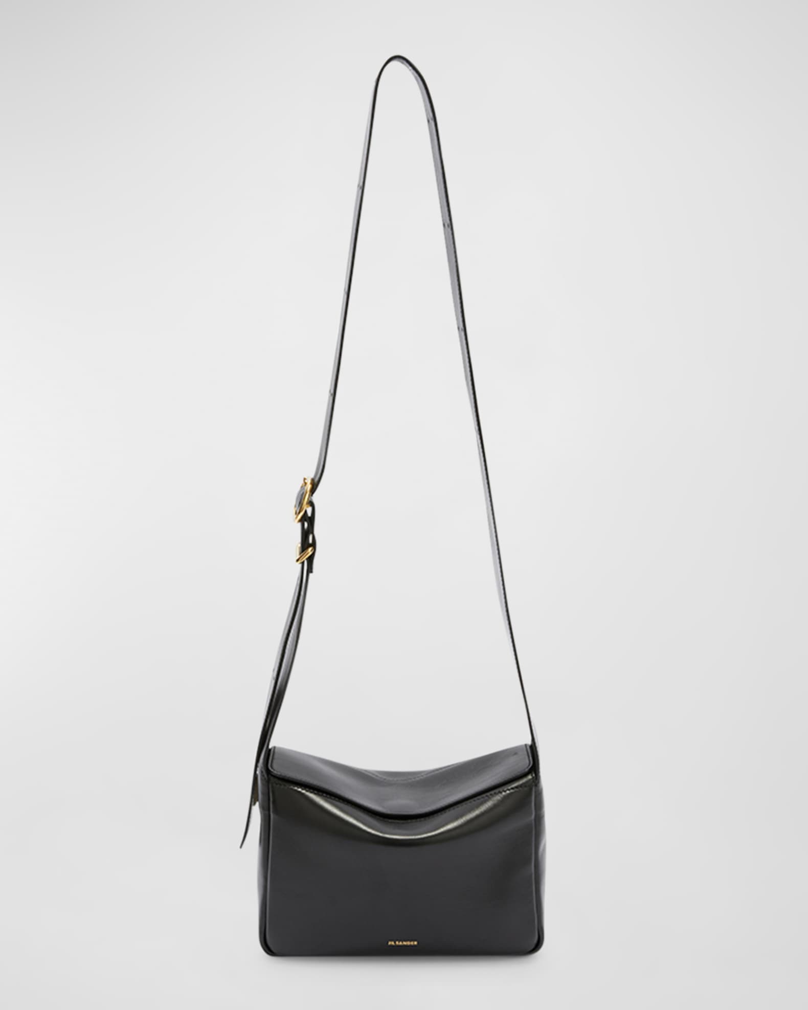 Flap leather messenger bag in black - Jil Sander