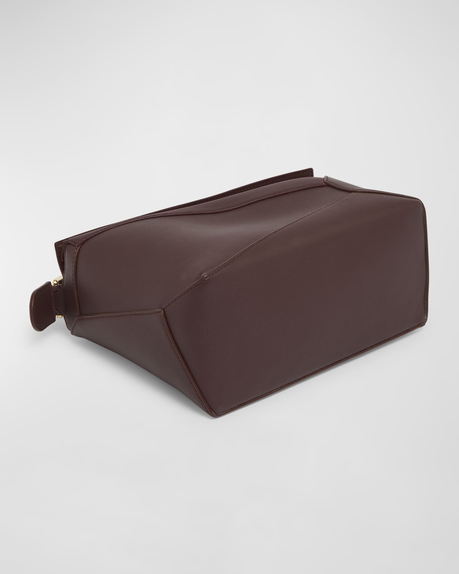 Puzzle Edge Small Top-Handle Bag in Leather 1