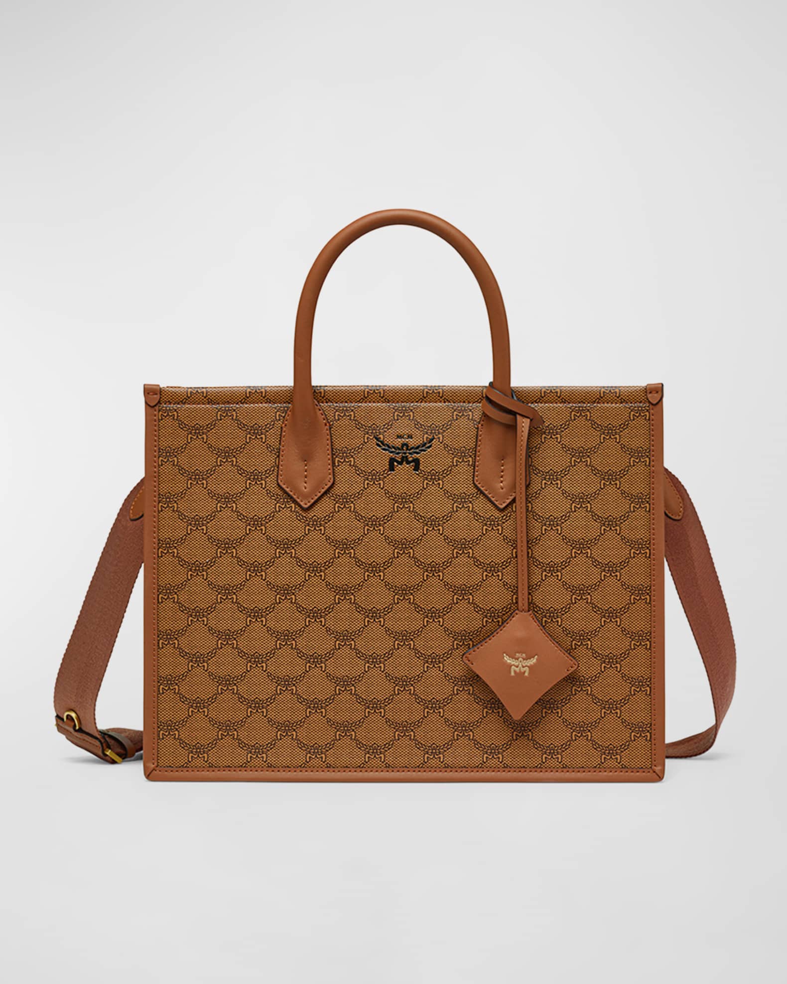 Louis Vuitton Monogram Kimono Handbag. This sophisticated handbag is