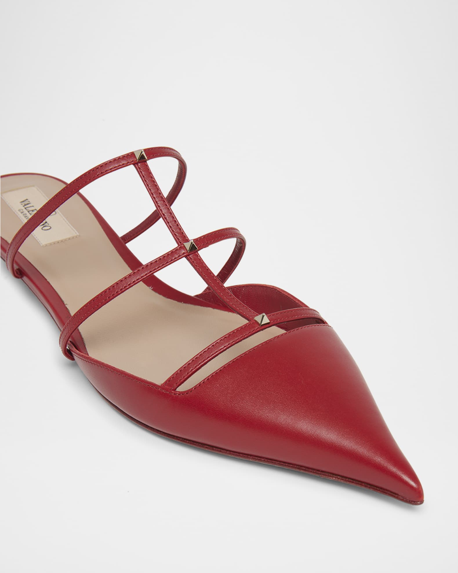 ROCKSTUD MULE SANDALS IN CHERRY RED CALFSKIN AND TRANSPARENT PVC FILM