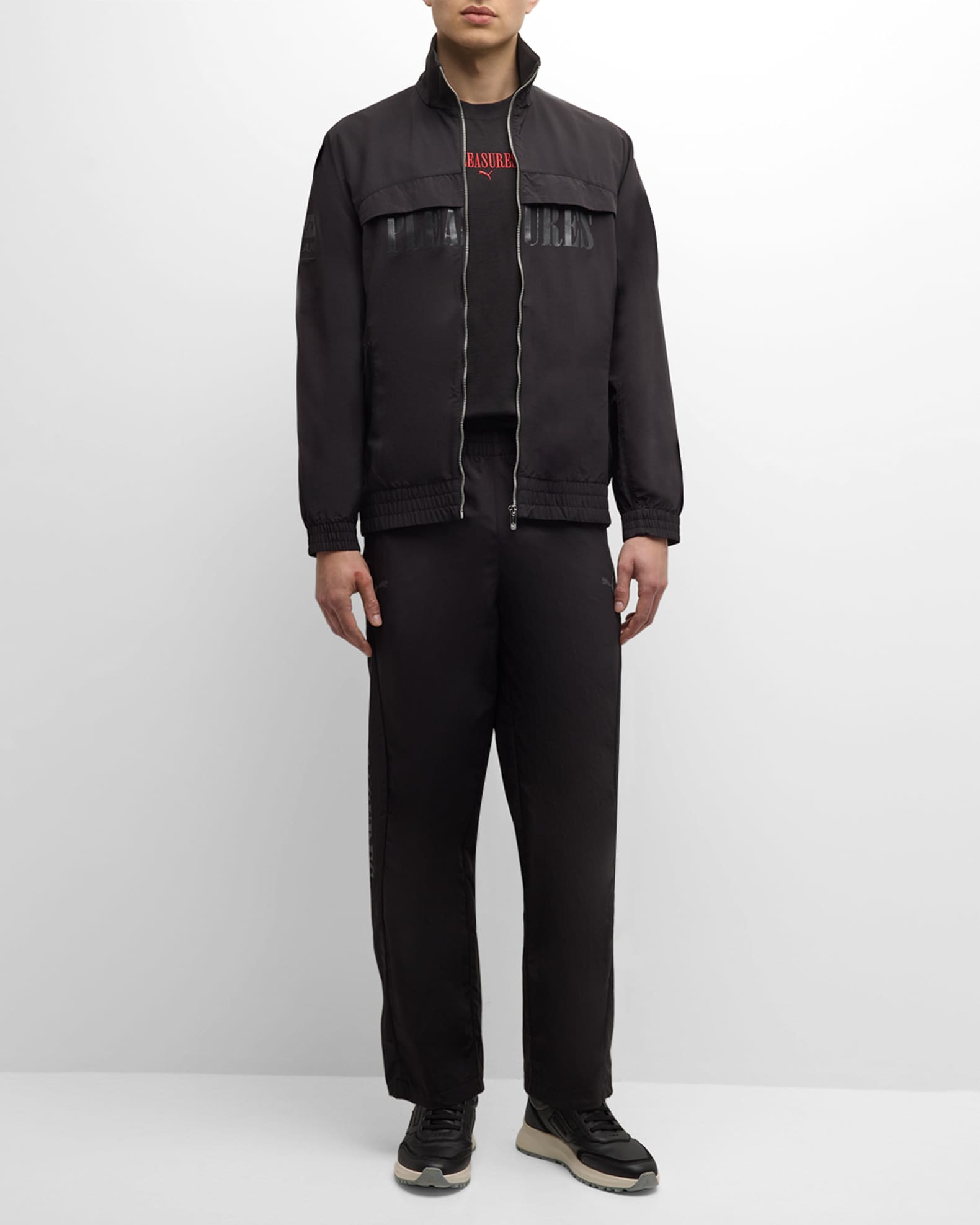 Puma track pants with zipper pockets store