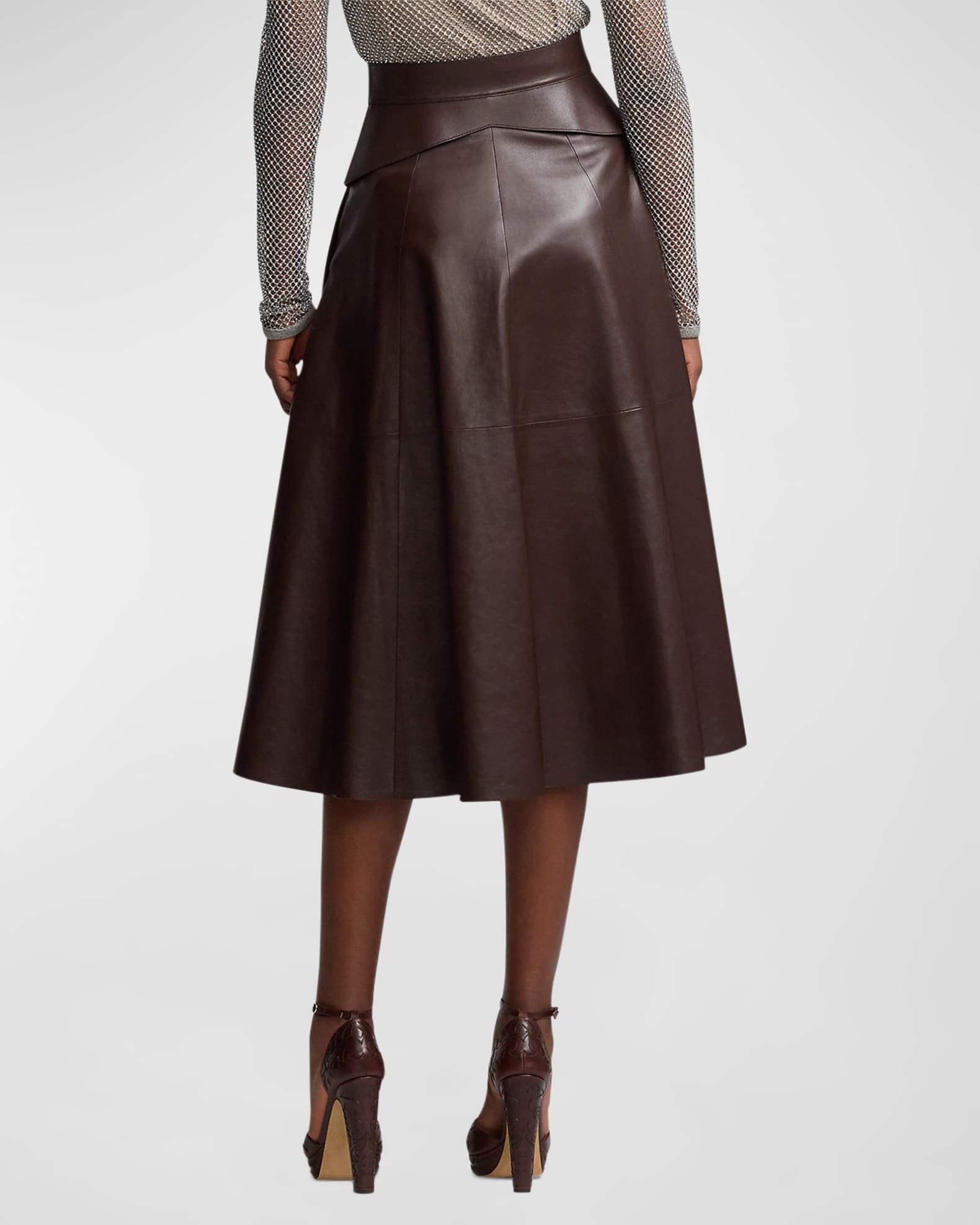 Brown leather shop skirt little words