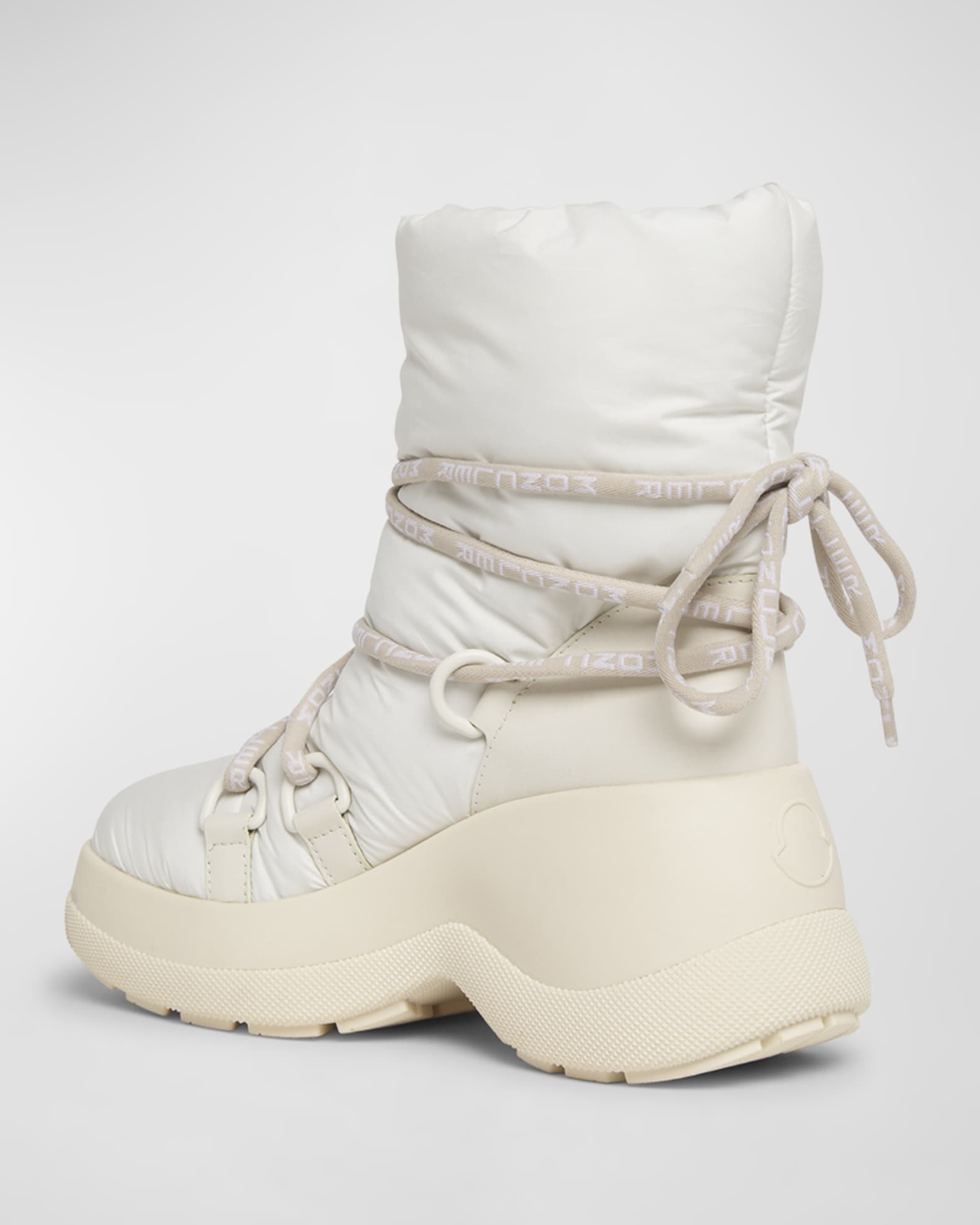 Louboutin puffy boots top