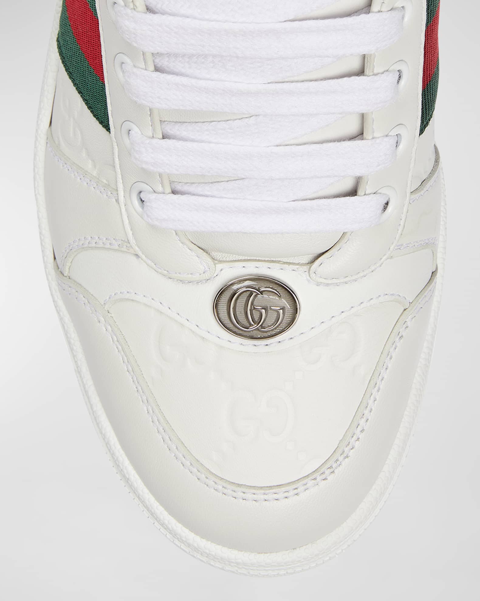 GG Embossed Leather Low Top Sneakers