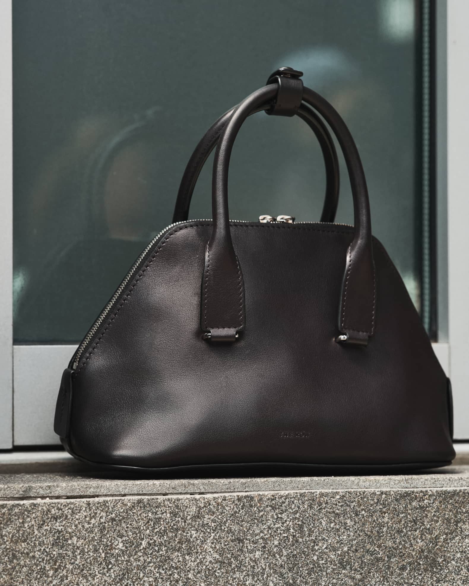 THE ROW Mini Devon in Saddle Leather | Neiman Marcus