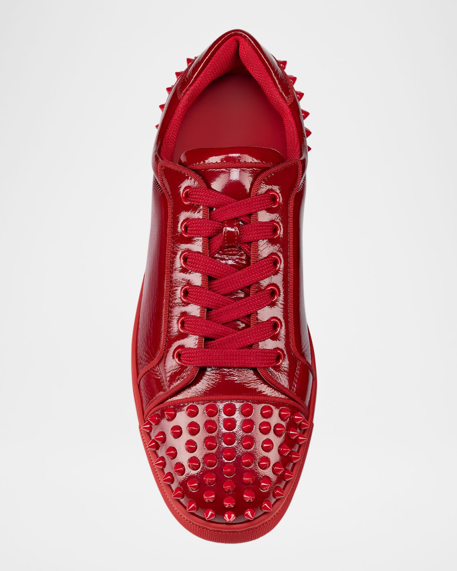 Red low top christian louboutins discount