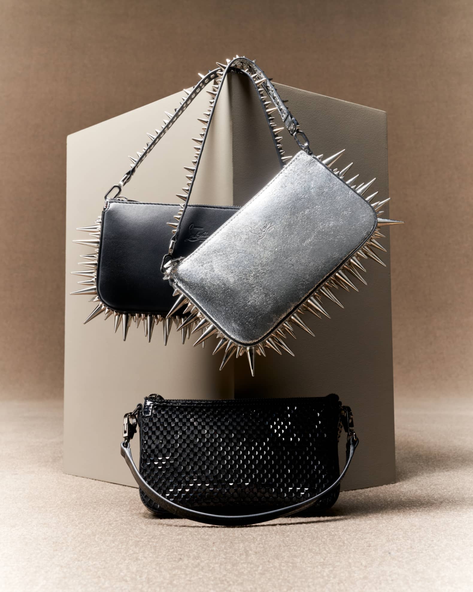 Louboutin spike bag hotsell