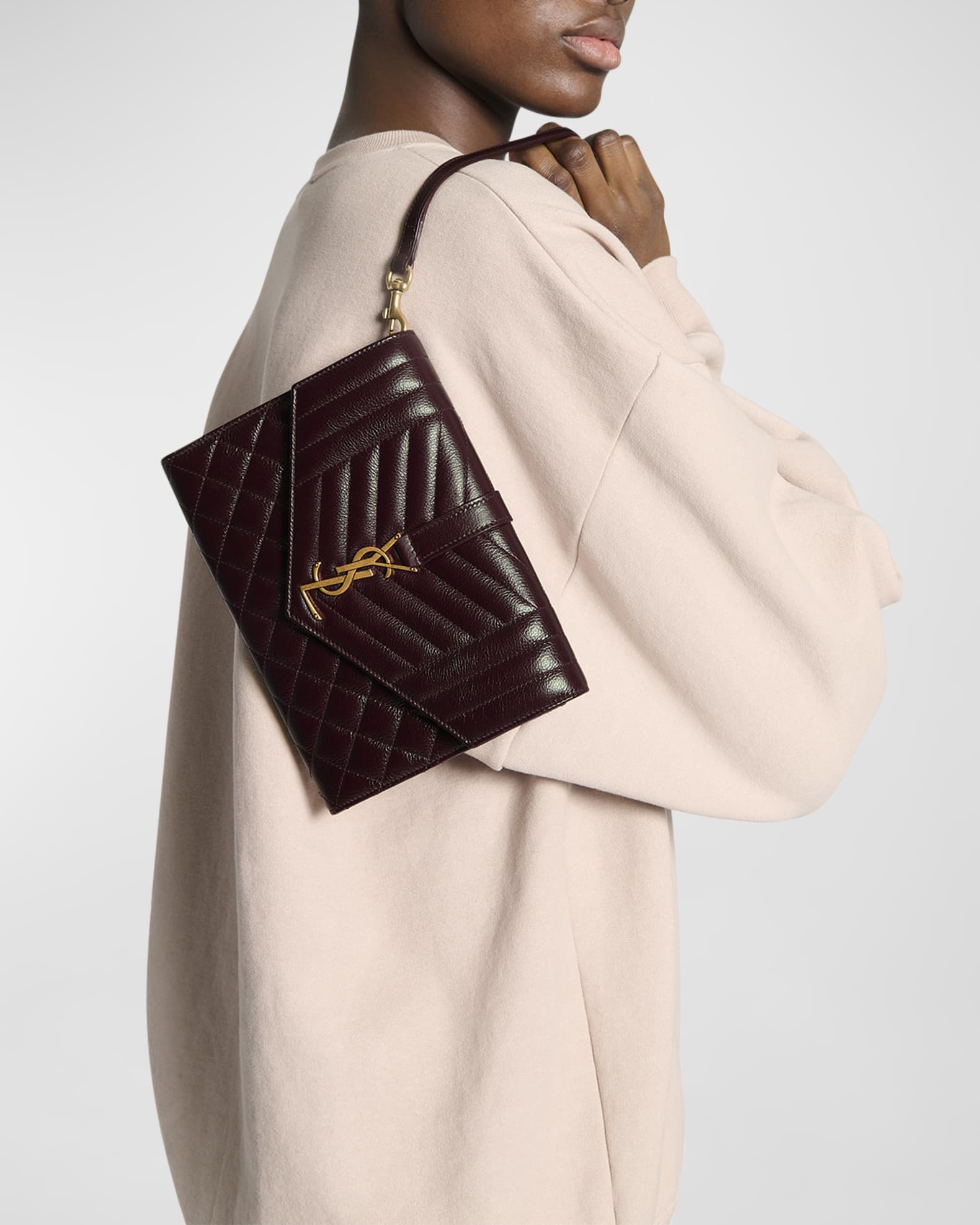 Ysl quilted leather pouch hotsell