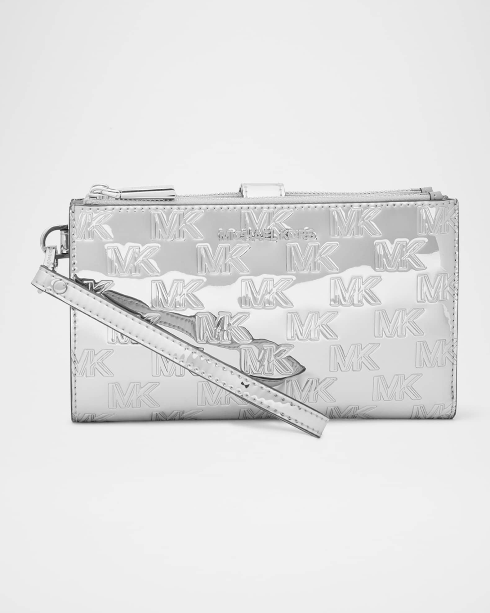 Michael kors metallic silver wristlet cheap