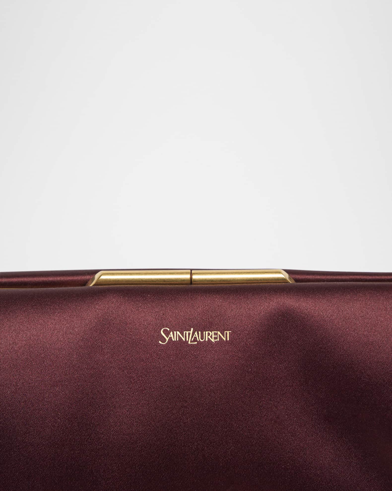 Small clutch with strap 2025