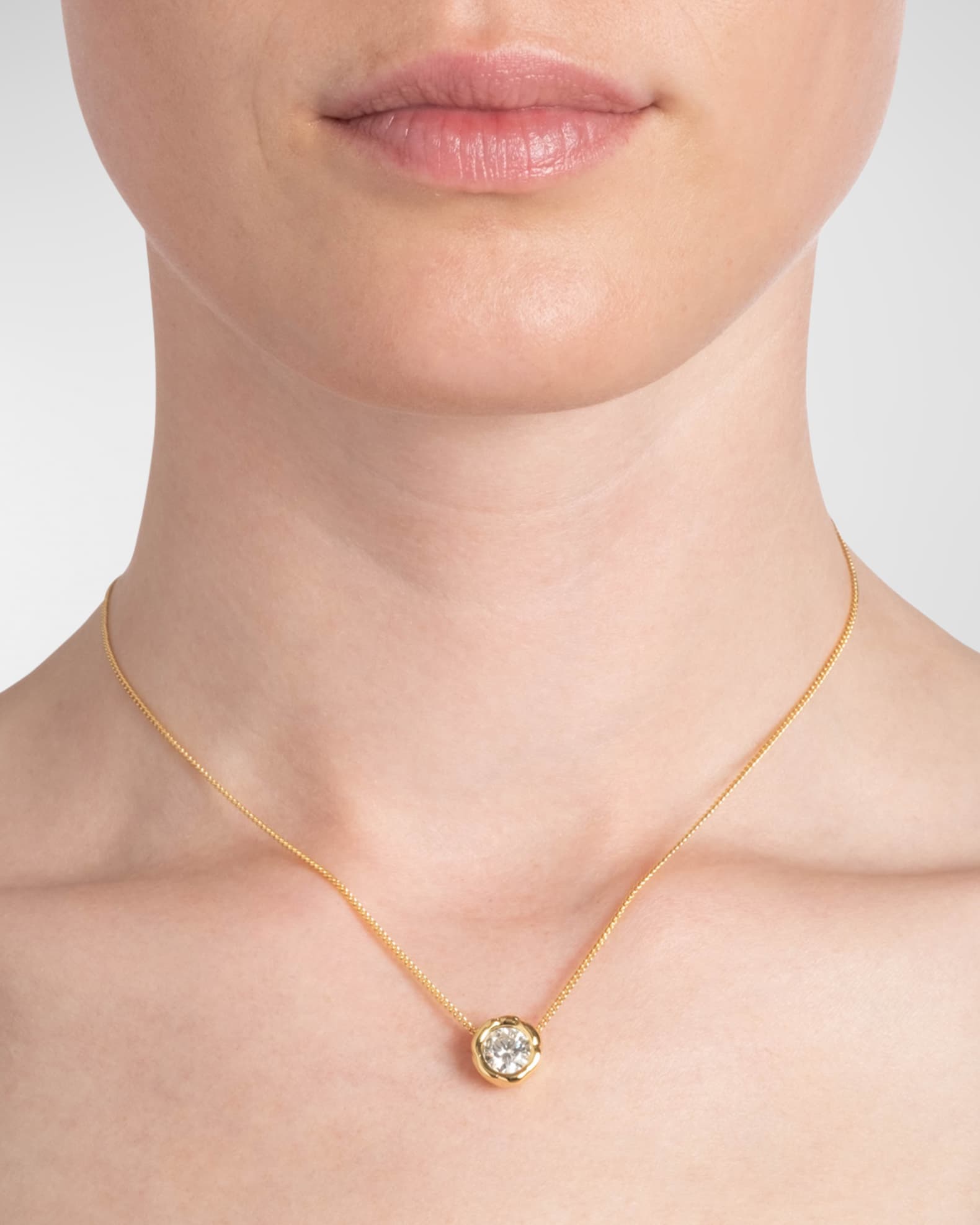 Asterales Gold Molten Cubic Zirconia Solitaire Necklace 1