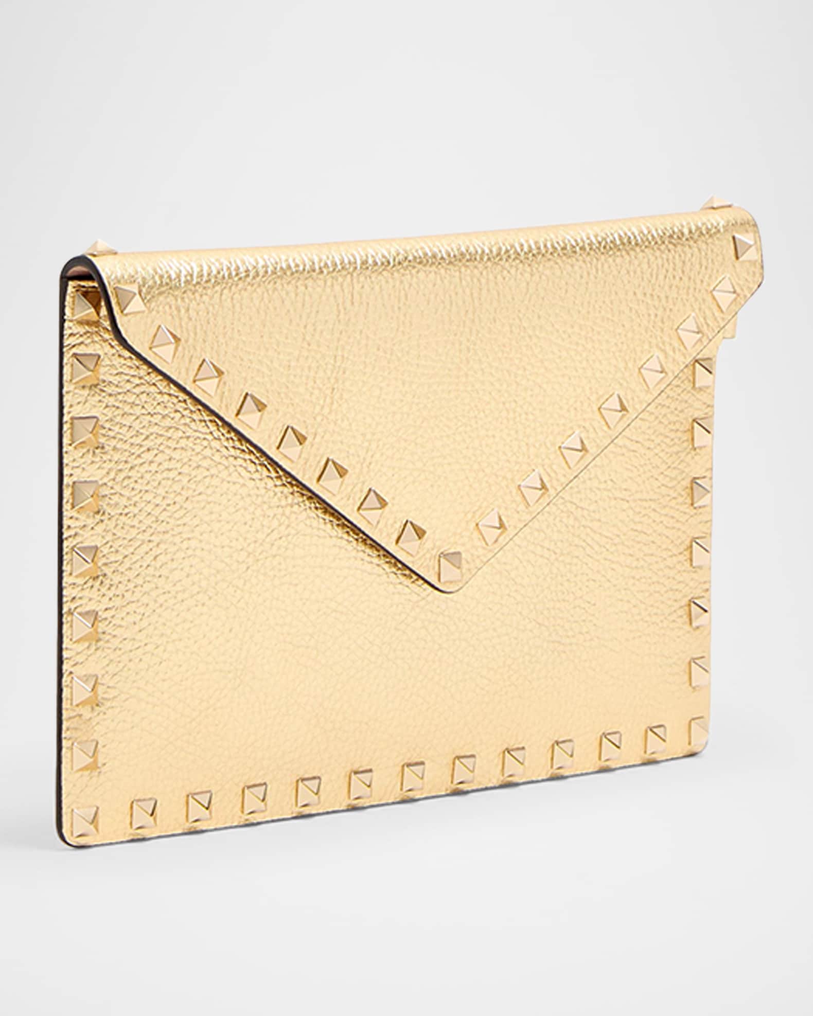 Rockstud Laminated Grainy Calfskin Clutch Bag 1