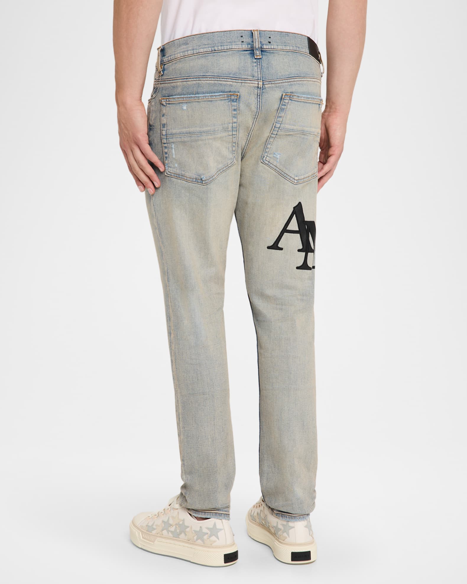 Amiri Men's Staggered Leather Logo Skinny Jeans | Neiman Marcus
