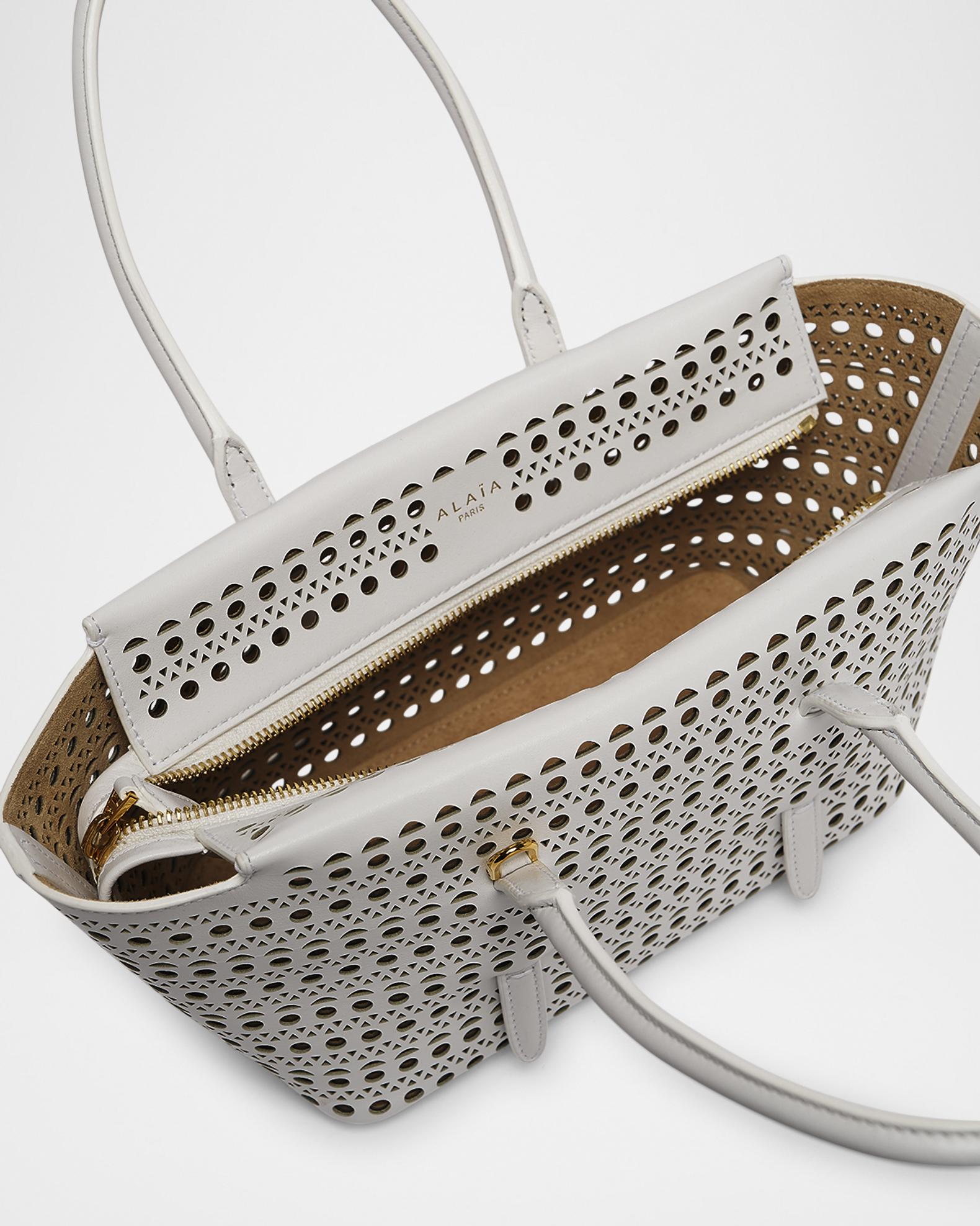 ALAIA Neo Mina 20 Perforated Leather Top-Handle Bag | Neiman Marcus