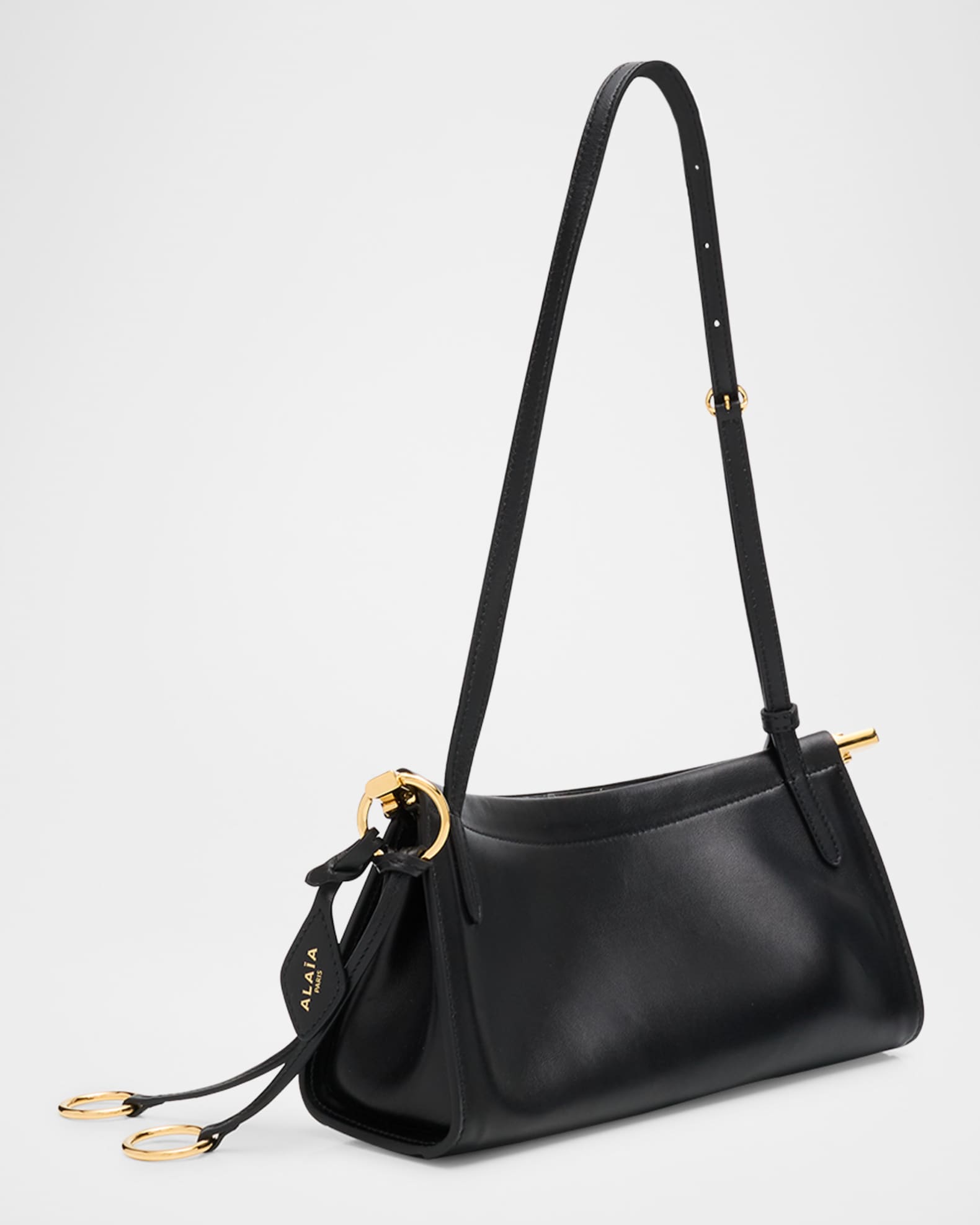【ALAIA】Le Click スモール レザー ショルダーバッグ ALAIA Le Click Small Shoulder Bag in Glossy Leather | Neiman