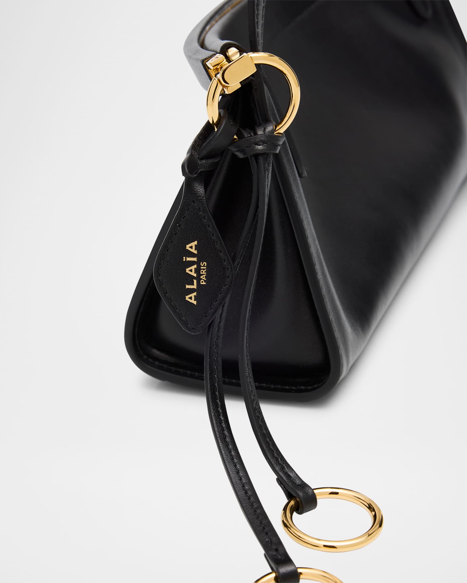 ALAIA Le Click Small Shoulder Bag in Glossy Leather | Neiman