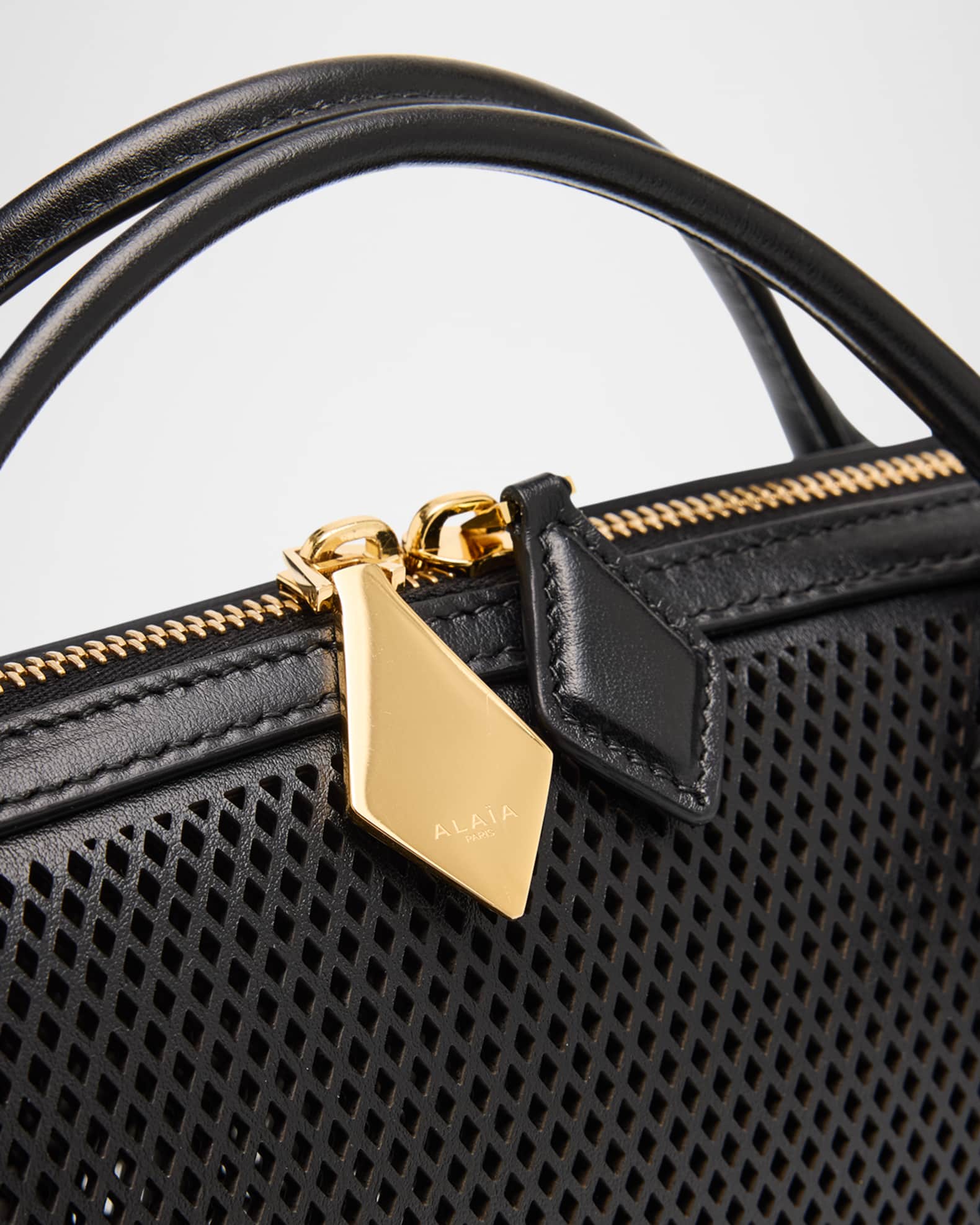 ALAIA Le Teckel Clutch Bag in Fishnet Leather | Neiman Marcus