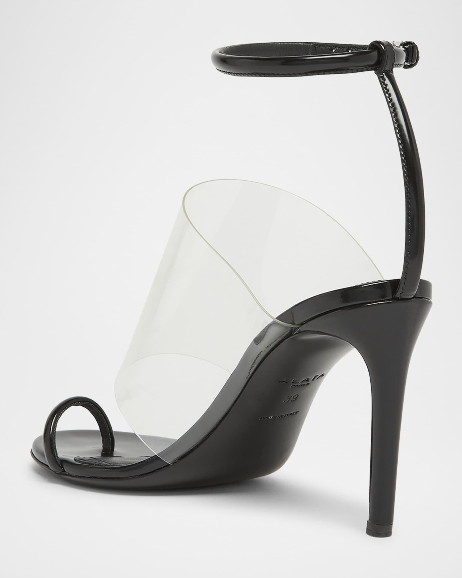 ALAIA Asymmetric Clear Patent Leather Sandals | Neiman Marcus