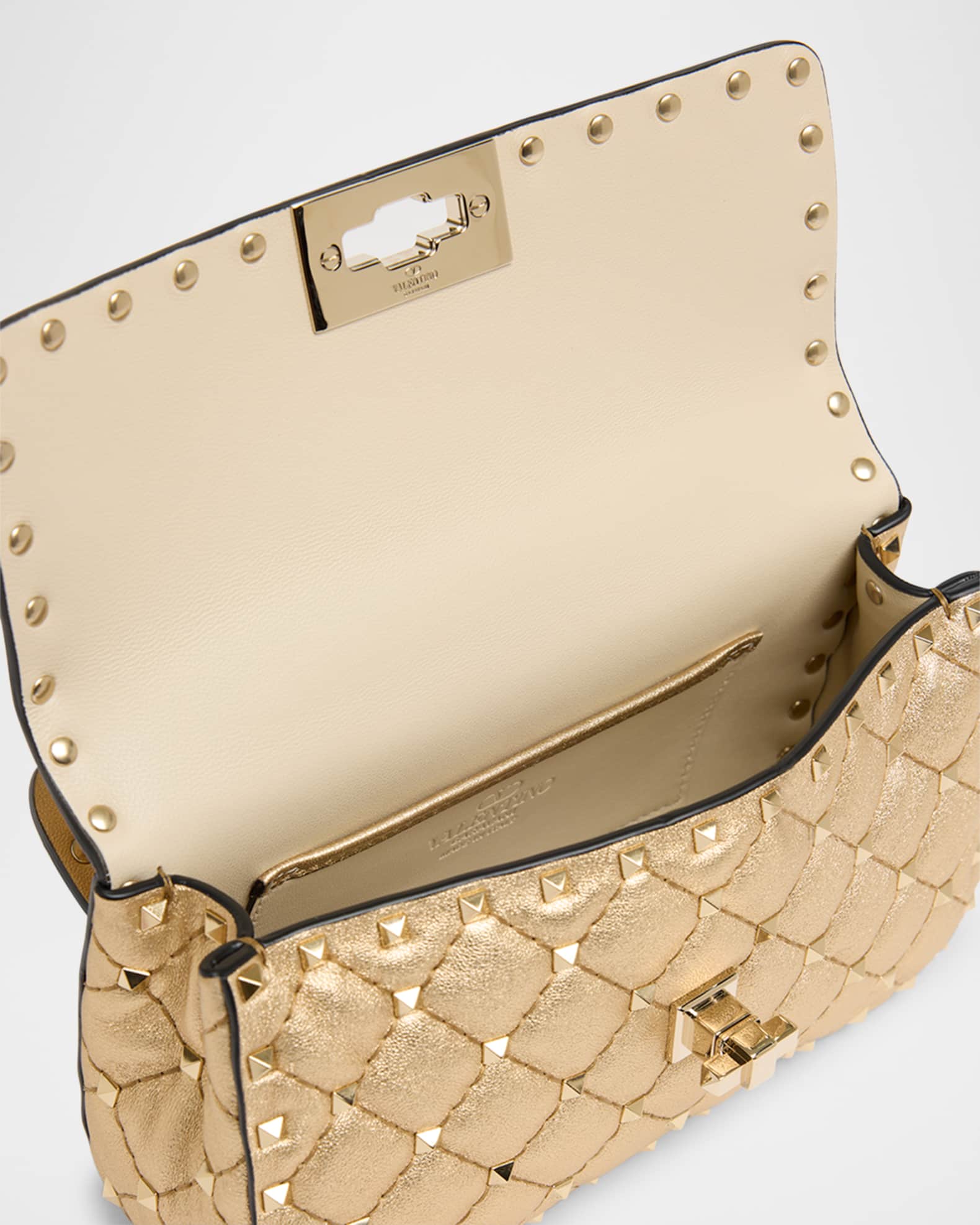 Valentino Garavani Quilted Rockstud Laminated Leather Top-Handle