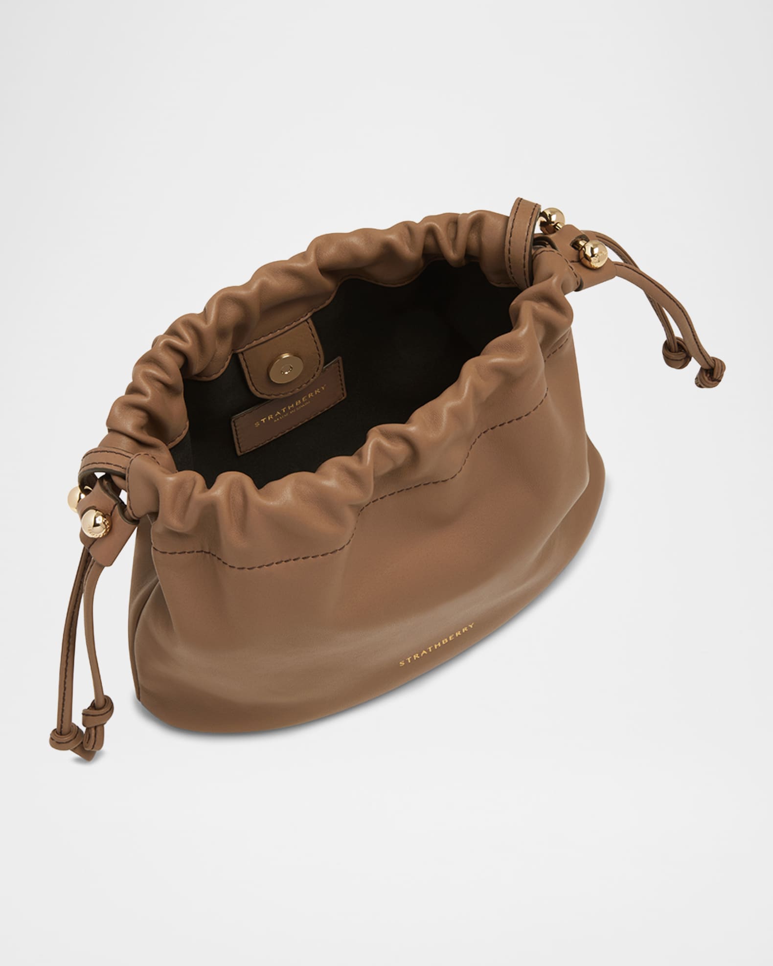 STRATHBERRY Charlotte Drawstring Leather Clutch Bag | Neiman