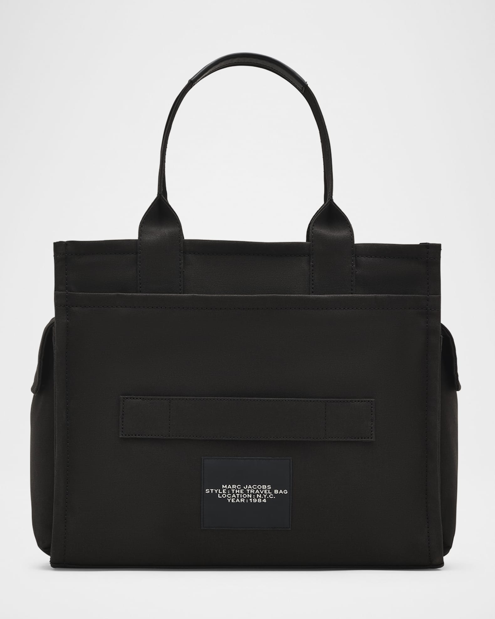 トートバッグ MARC JACOBS BLACK CANVAS THE SMALL TRAVELER TOTE BAG Amazon.com: Marc Jacobs Women's The Canvas Small Tote Bag