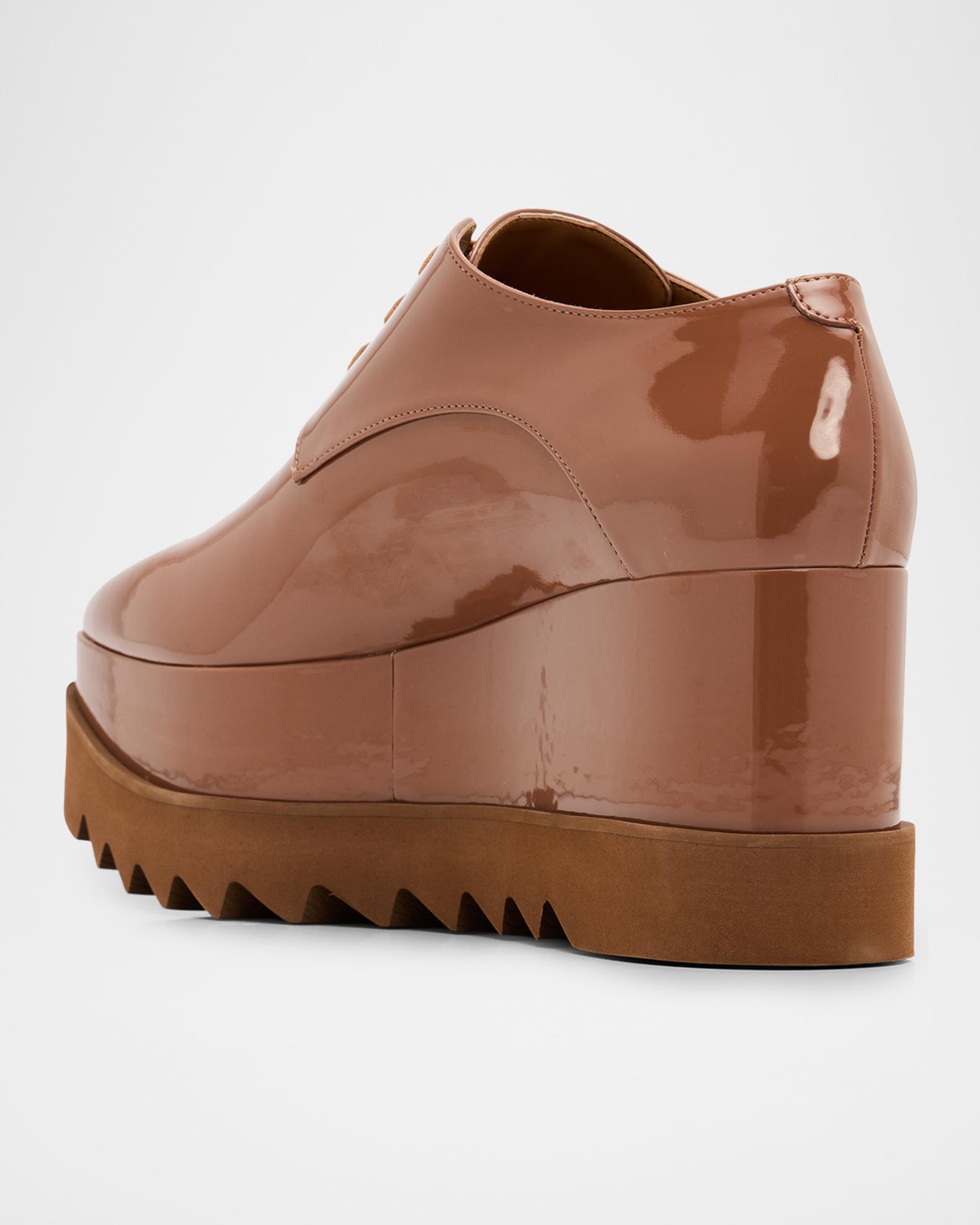 Stella McCartney Elyse Shiny Patent Wedge Sneakers | Neiman Marcus