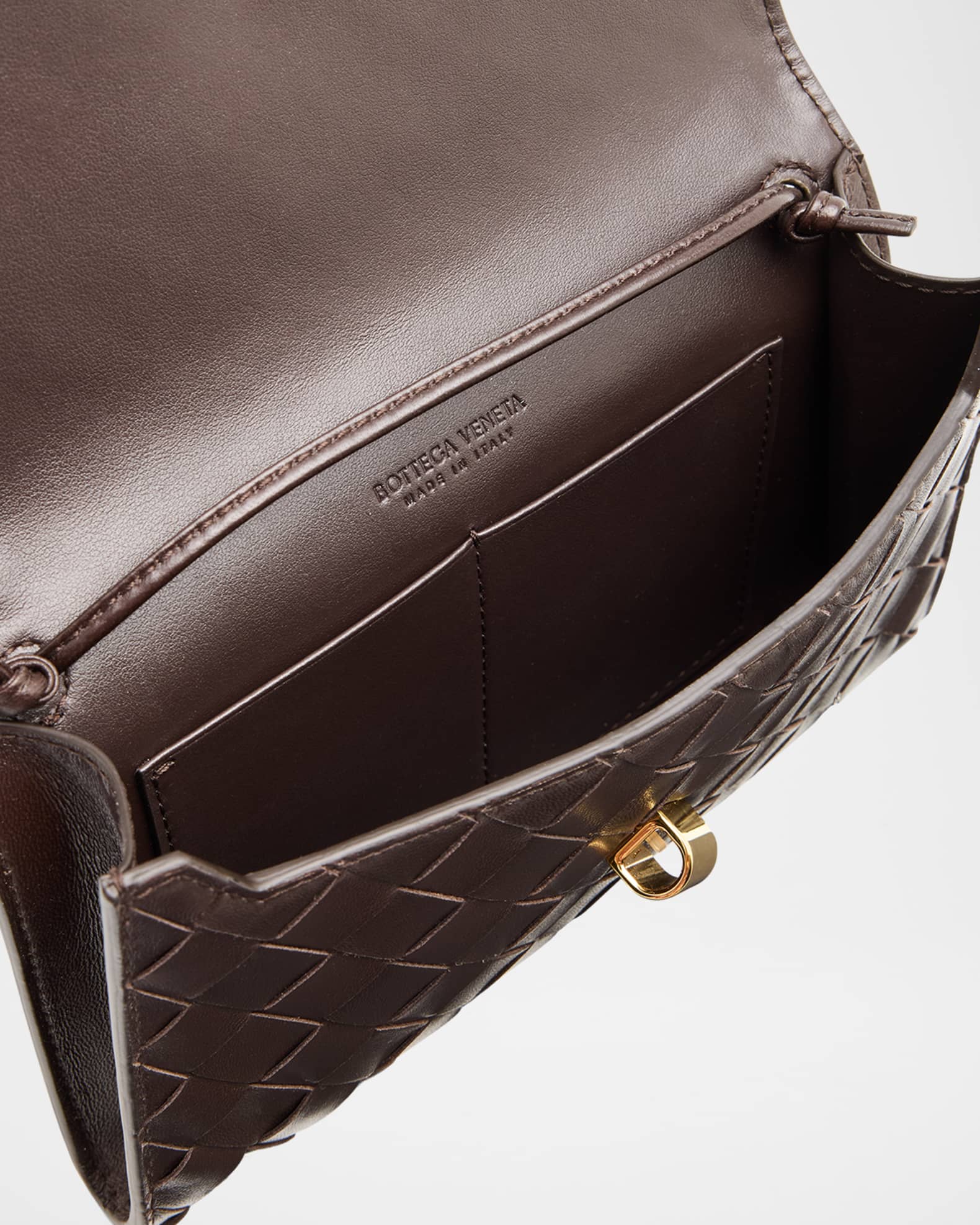 BOTTEGA VENETA◆Andiamo ナッパレザー ポーチ メタルノット Bottega Veneta Andiamo Metallic Leather Pouch Bag | Neiman