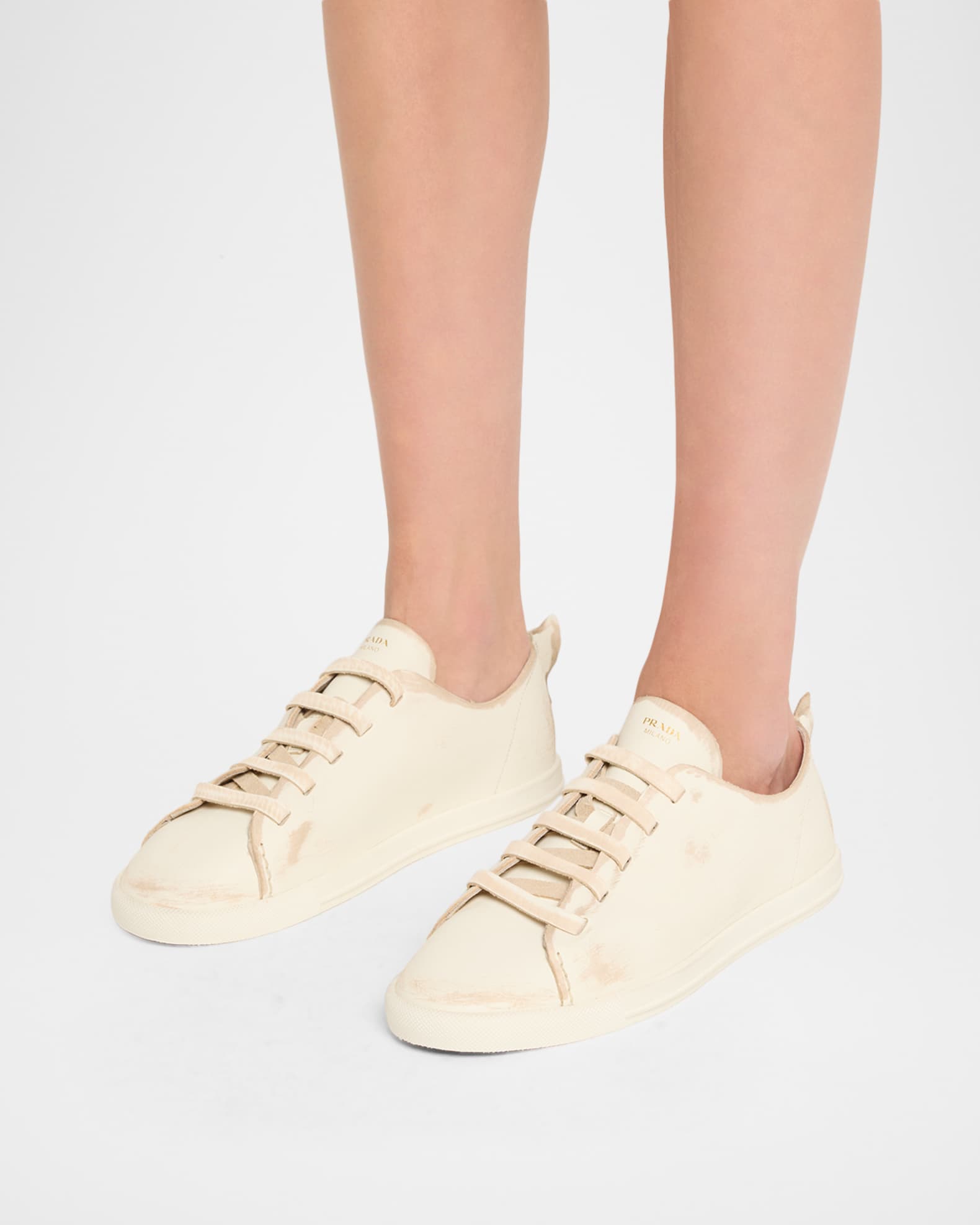 Prada Distressed Low-Top Leather Sneakers | Neiman Marcus