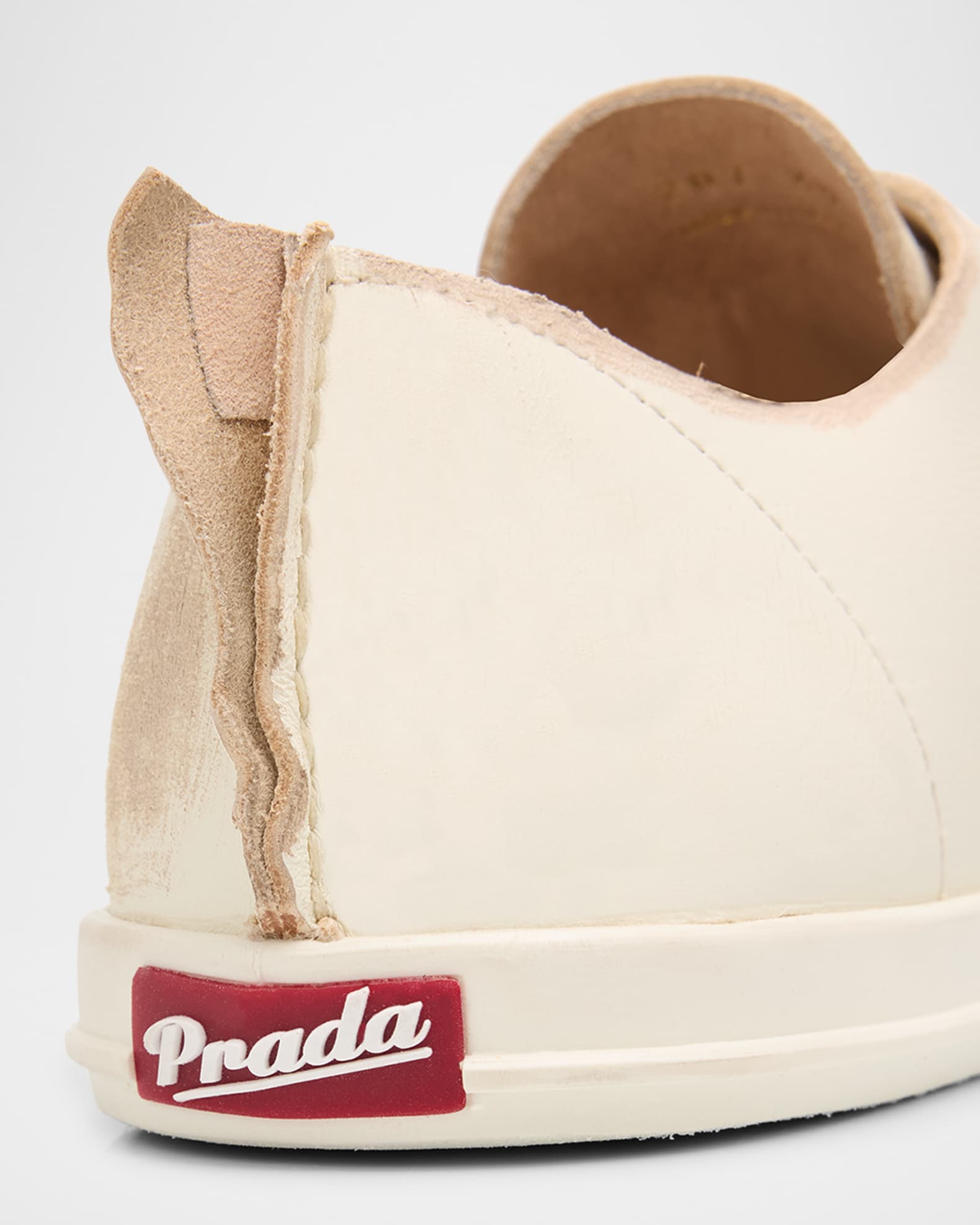 Prada Distressed Low-Top Leather Sneakers | Neiman Marcus