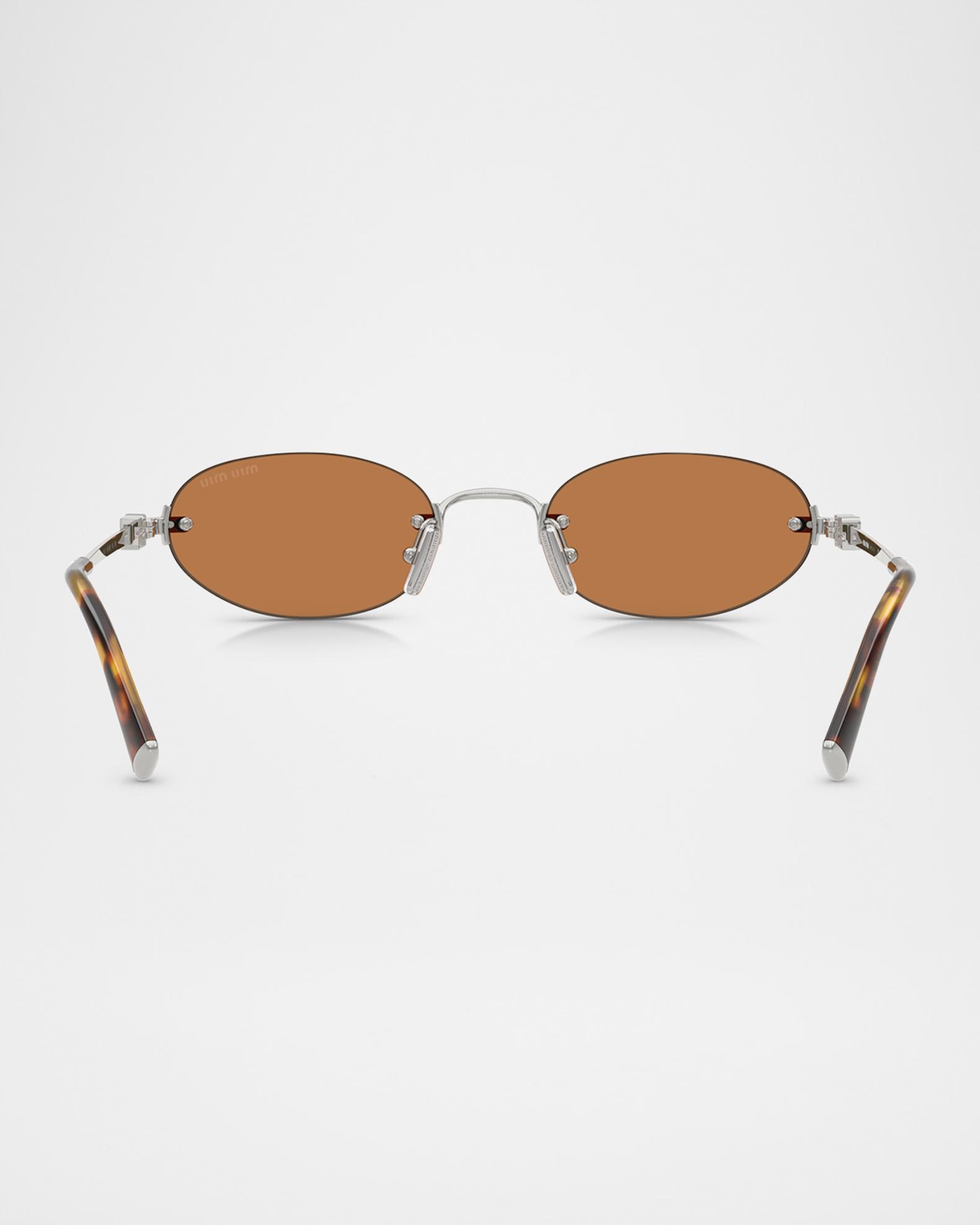 Miu Miu Rimless Metal Oval Sunglasses | Neiman Marcus display picture 2