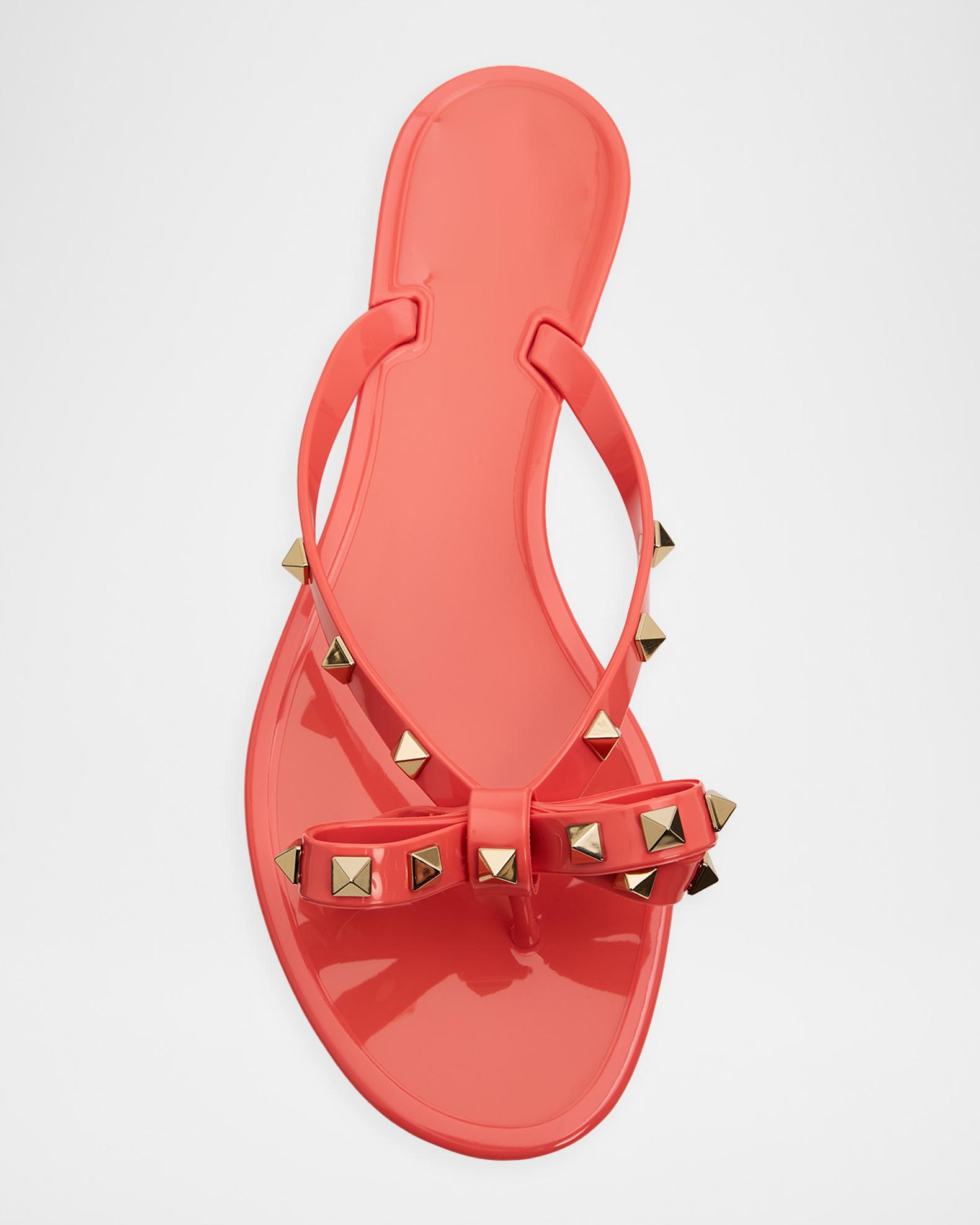 Valentino Garavani Rockstud PVC Flat Thong Sandals | Neiman Marcus