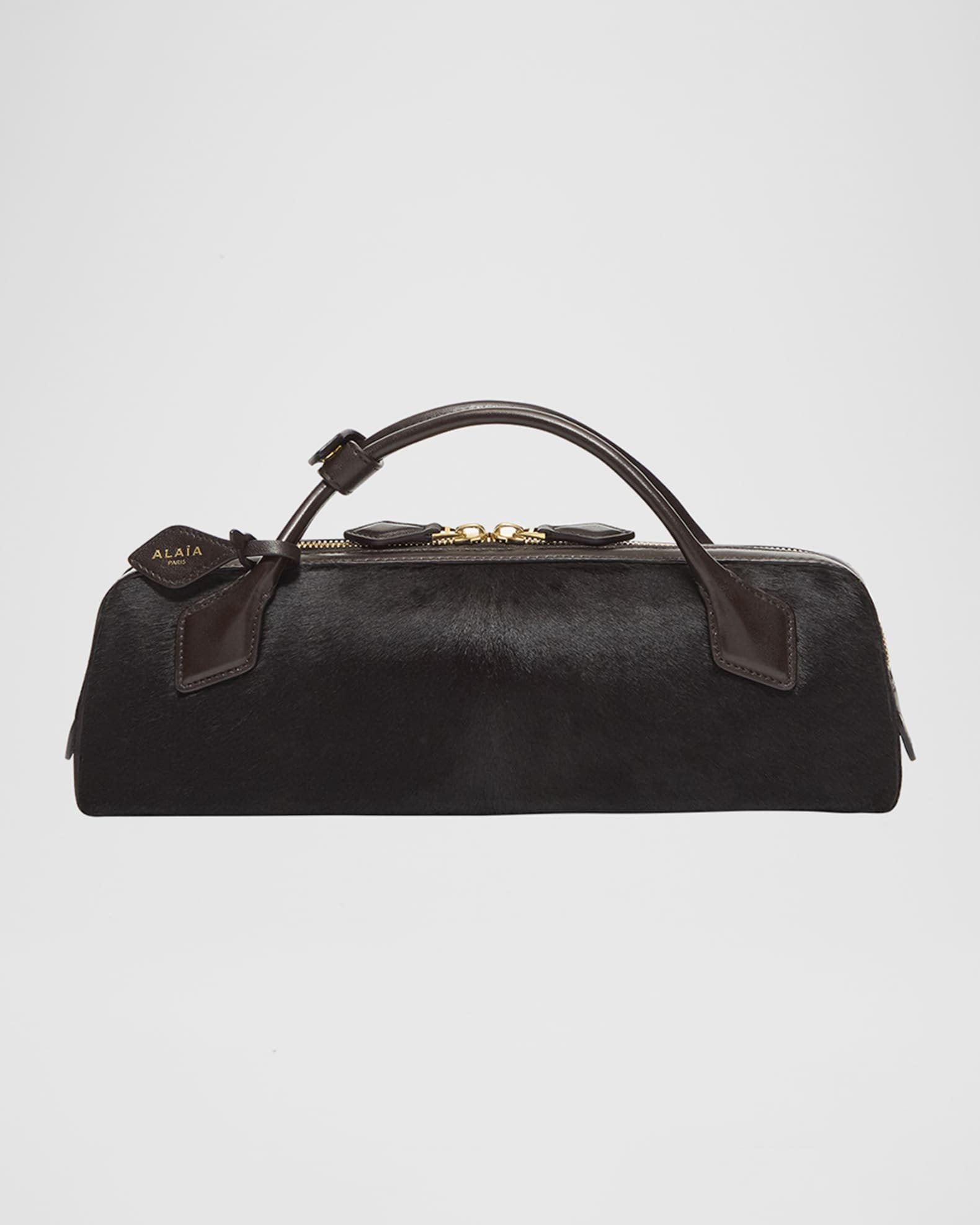 ALAIA Elongated Calf Hair Clutch Bag | Neiman Marcus