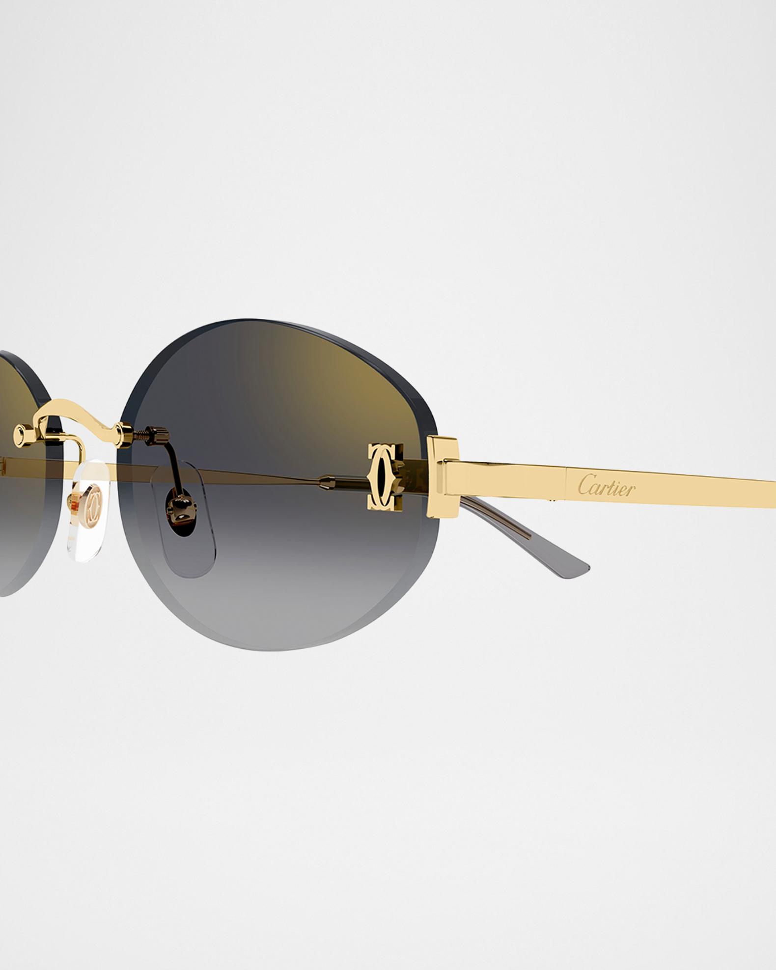 Cartier C de Cartier Rimless Metal Oval Sunglasses | Neiman  display picture 2