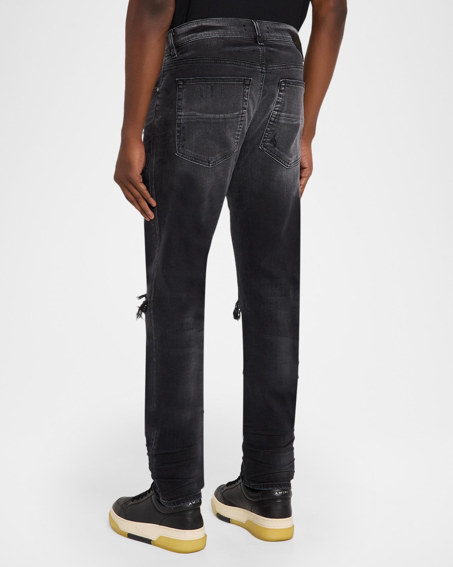 Amiri Men's Mx1 Ultrasuede-Repaired Stretch Denim Jeans | Neiman