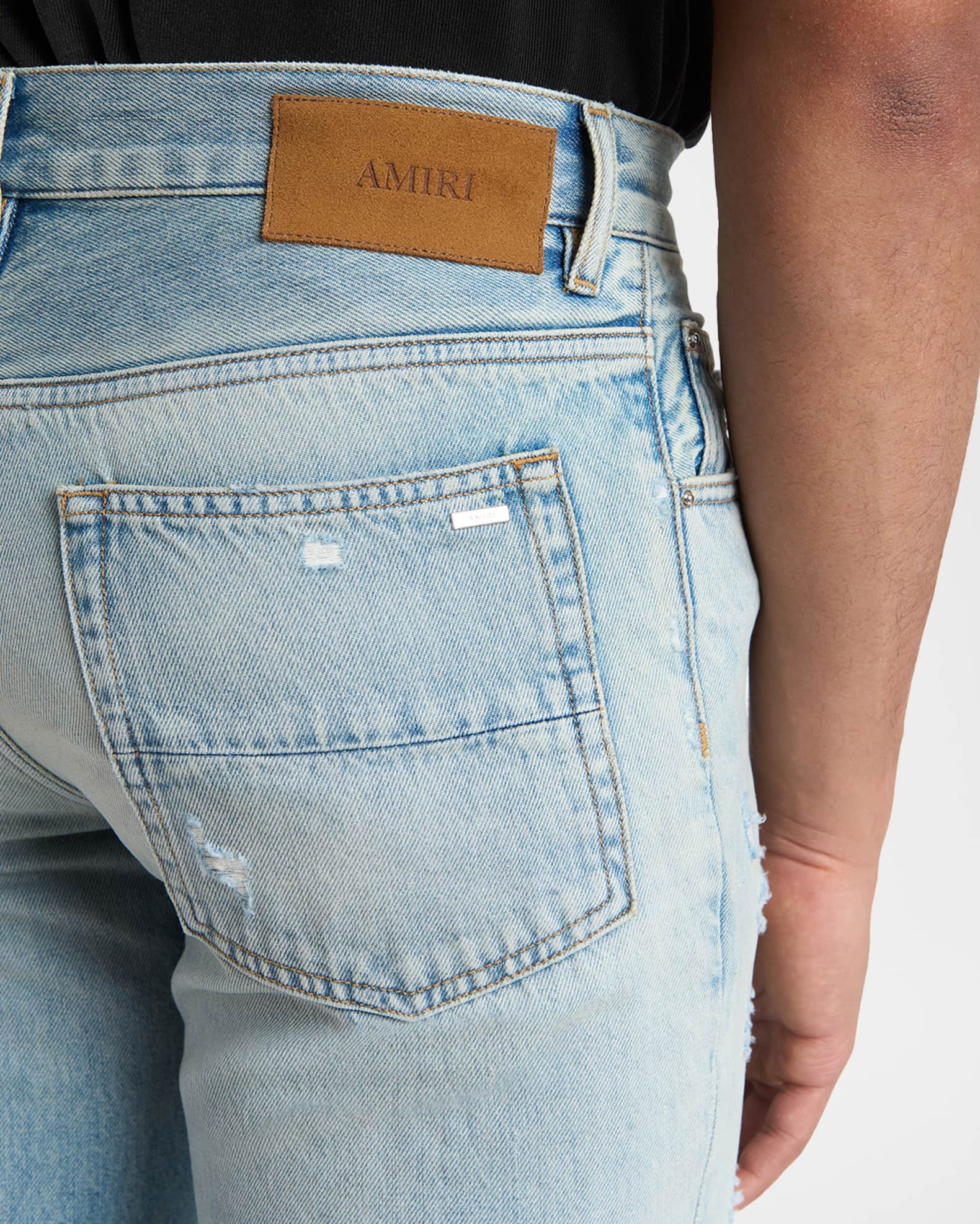Amiri Men's MX1 Distressed Slim-Fit Flare Jeans | Neiman Marcus